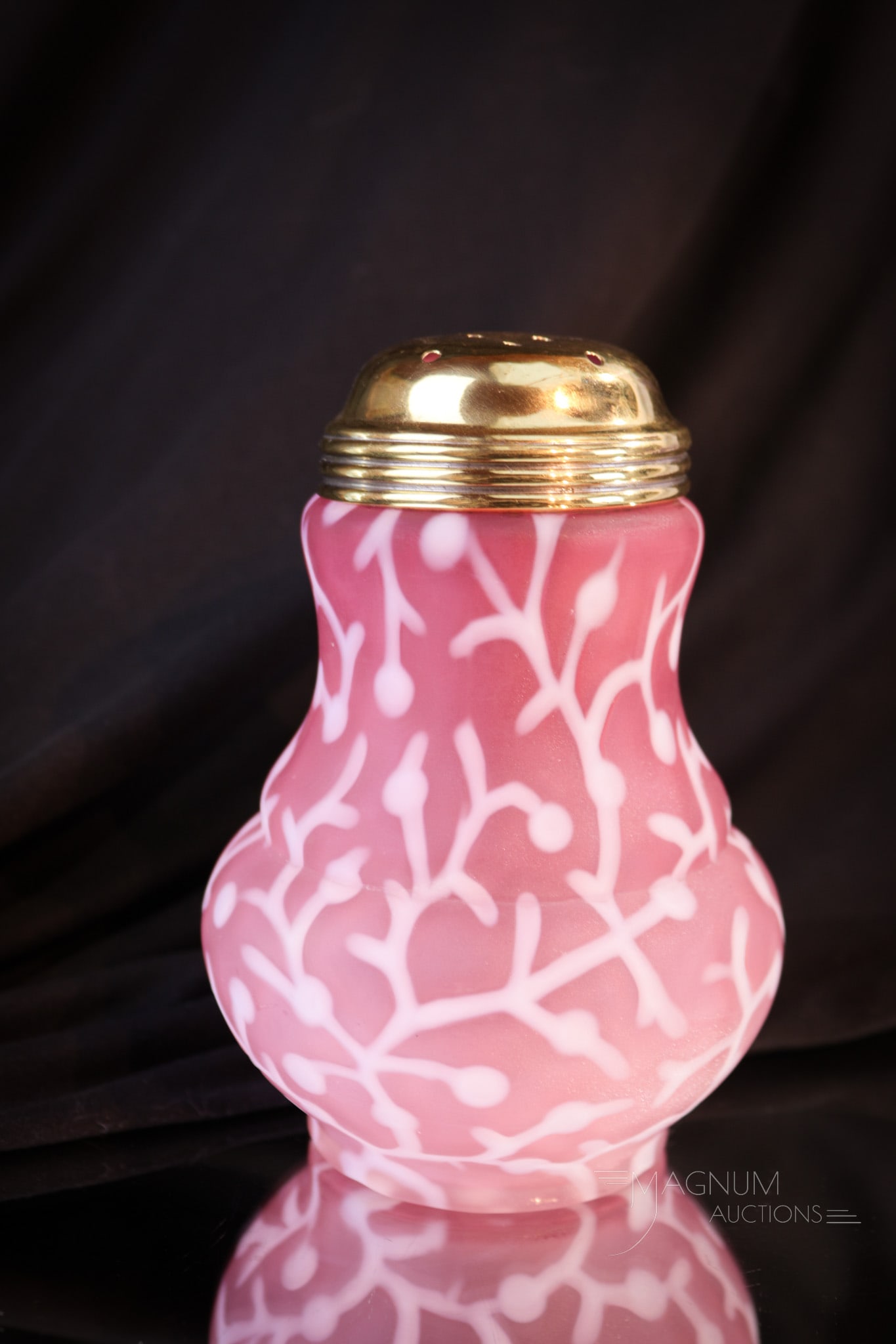 Hobb's Cranberry Opalescent Satin Victorian Sugar Shaker: Also a rare find in our line up of Hobb's Seaweed pattern is this satin sugar shaker in cranberry opalescent glass. Rich velvety satin finish. Fine color as well. This sugar shaker stands 5" tall.