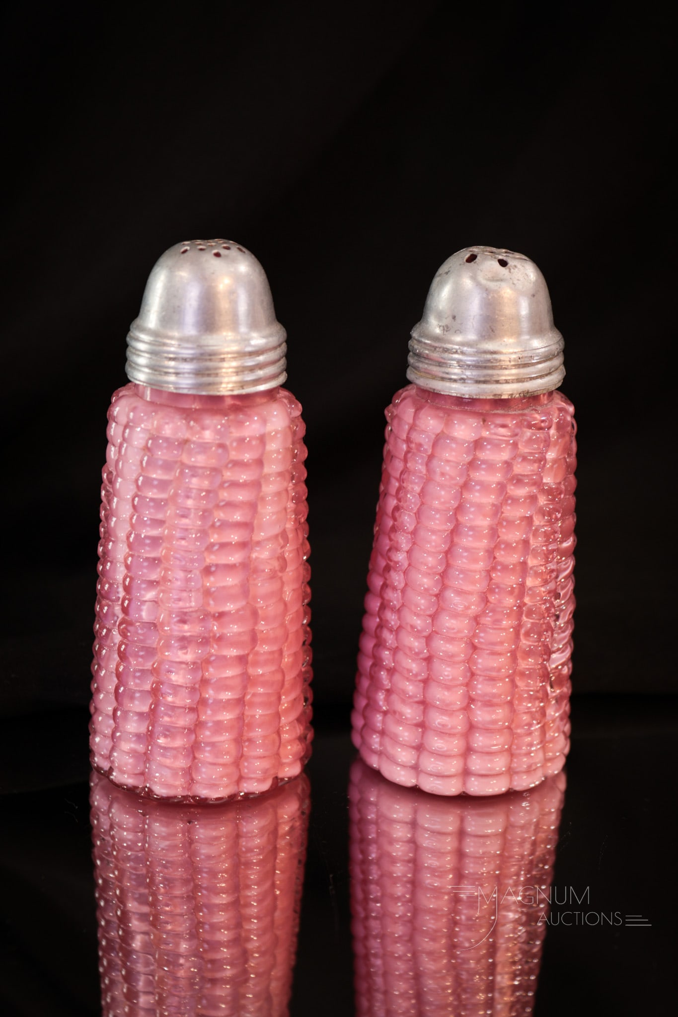 Pr Pink Cased Victorian Glass Corn Cob Shakers: Who can have enough of these corn cob shakers? These are cased pink glass with truly bumpy corn kernel pattern. Just exciting to look at and when you feel them, Oh my! Each of these ears measures 3 3/