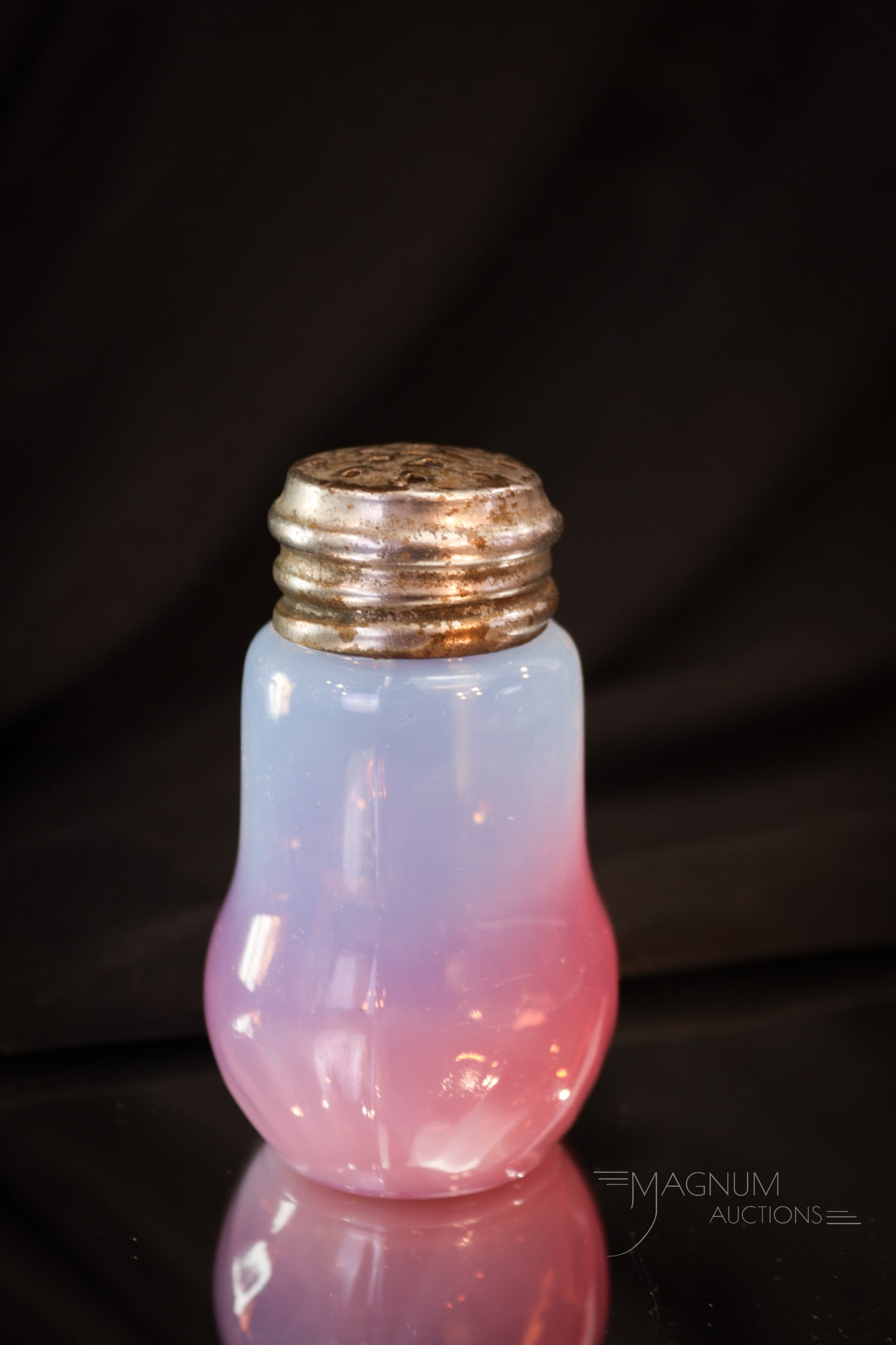 Rare Reverse Rubina Opalescent Windemere's Fan Salt Shaker: A rare find in our line up of Victorian glass salt shakers. This is a rare reverse rubina opalescent in the Windemere's Fan pattern. Who knew. Bet you Salties don't have this one! Shaker measures 3 1/