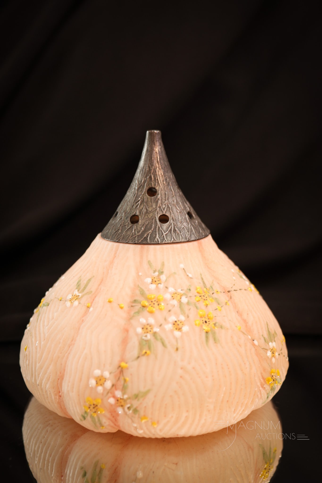 Mt. Washington Fig Victorian Glass Sugar Shaker Muffineer: A plump Victorian Mt. Washington glass Fig sugar shaker. This lovely of Victorian glass is delicately decorated with yellow and white florals on a peachy color ground. Shaker measures 4" tall.