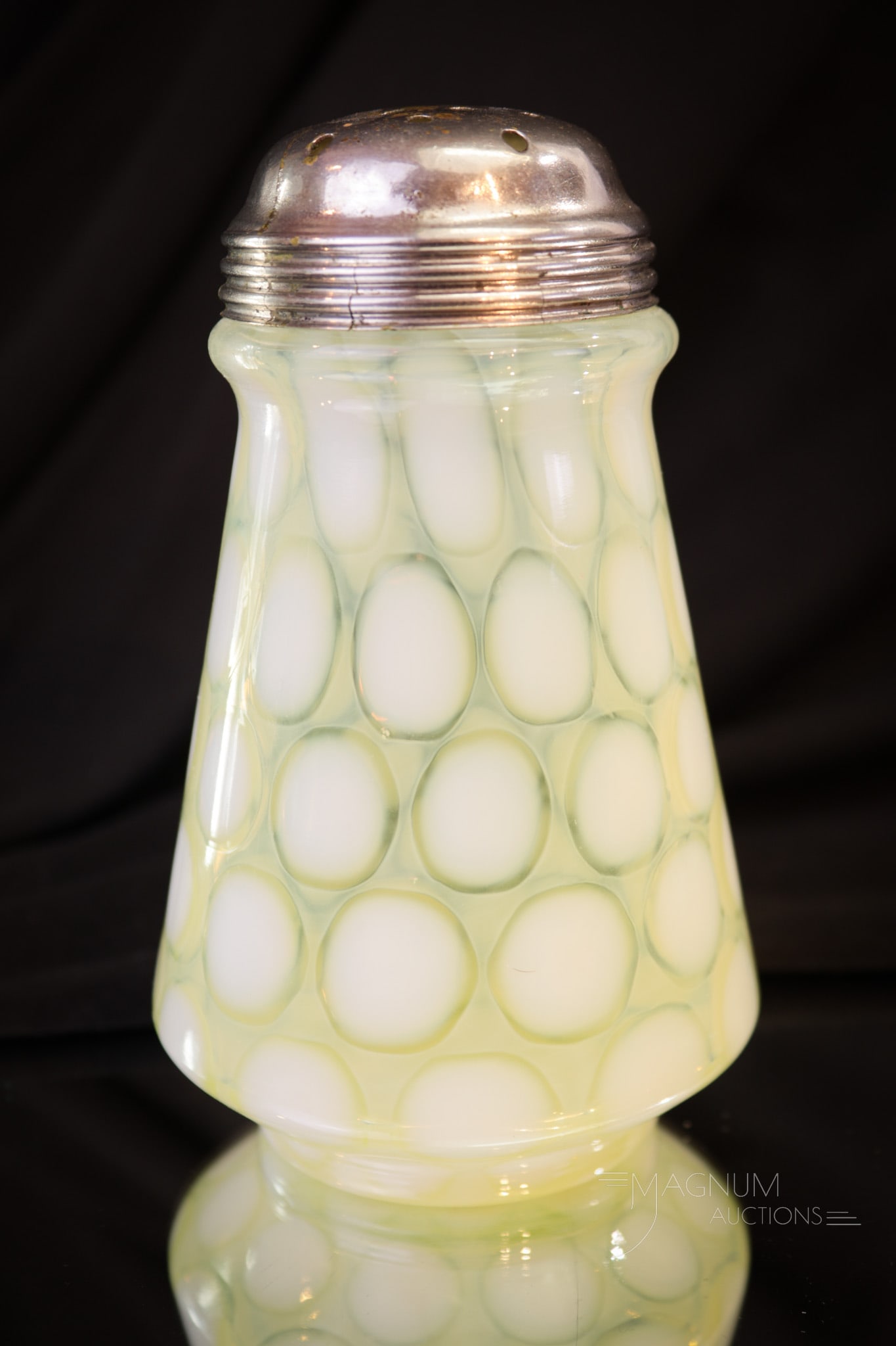 Vaseline Opalescent Coinspot Victorian Glass Sugar Shaker: Extraordinary Victorian glass sugar shaker in vaseline glass. This one in a tapered form with opalescent coinspot pattern. Sugar shaker measures 5 1/4" tall. Provenance: This item is from the private 