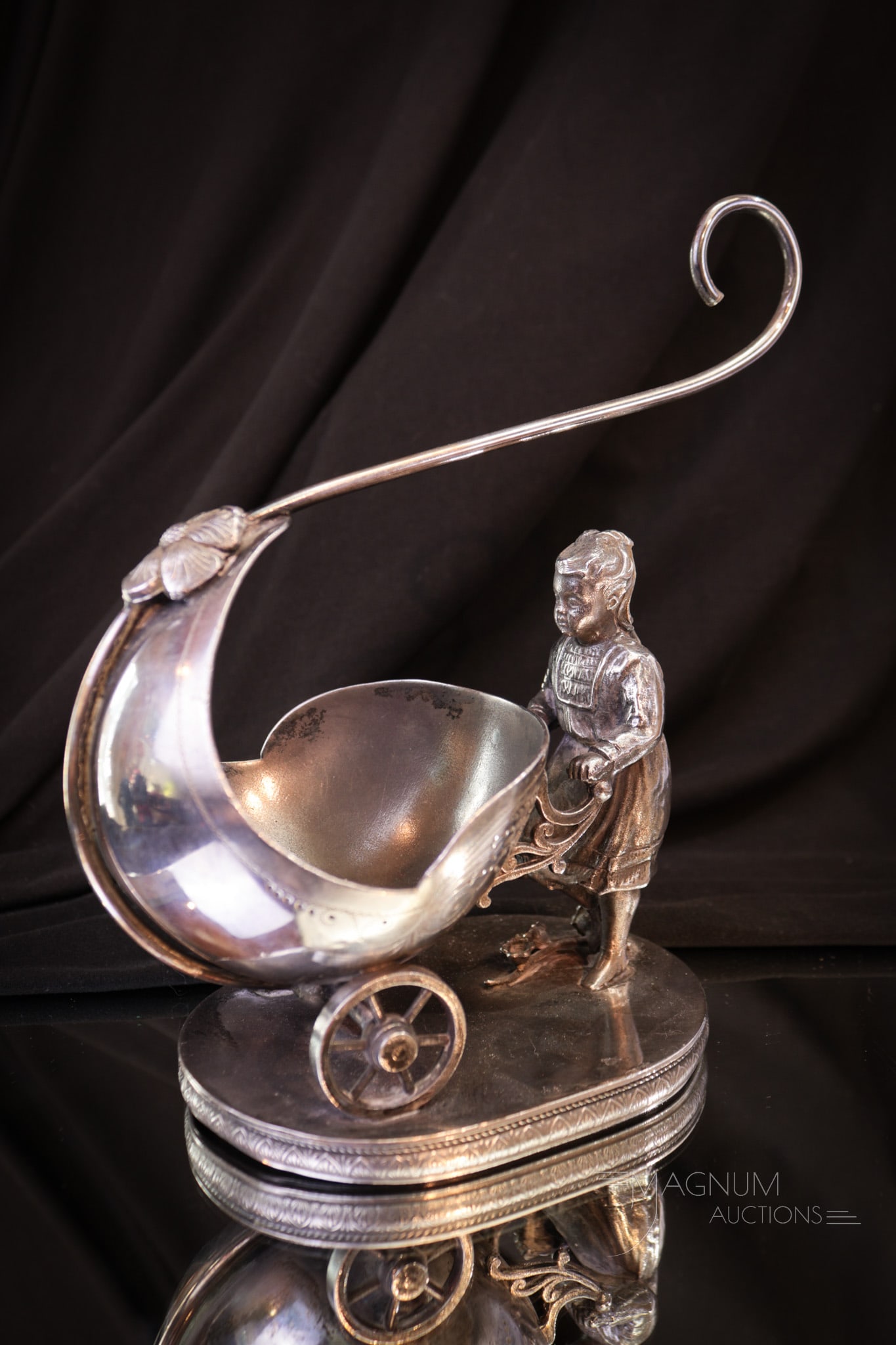 Mermod Victorian Silver Plate Baby Buggy Calling Card Receiver: Fine figural silver plate signed Mermod calling card receiver in the form of a girl pushing a baby buggy. This lovely is a fancy typical of the extraordinary silverplate of the Victorian era. Measures