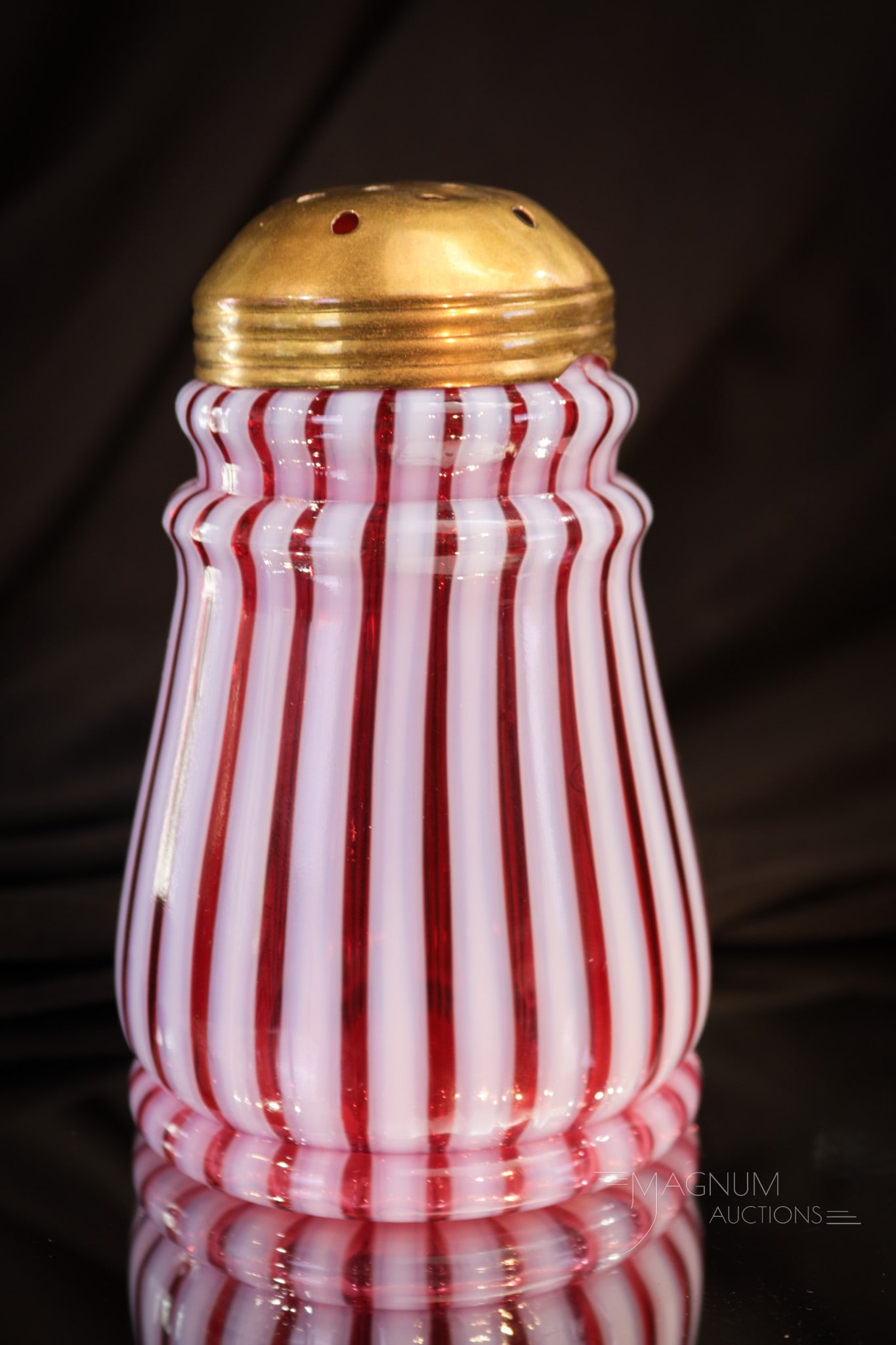 Cranberry Opalescent Victorian Glass Stripe Sugar Shaker: Gorgeous cranberry opalescent Victorian glass sugar shaker in the ringneck mold and the stripe pattern. This one measures 5" tall.