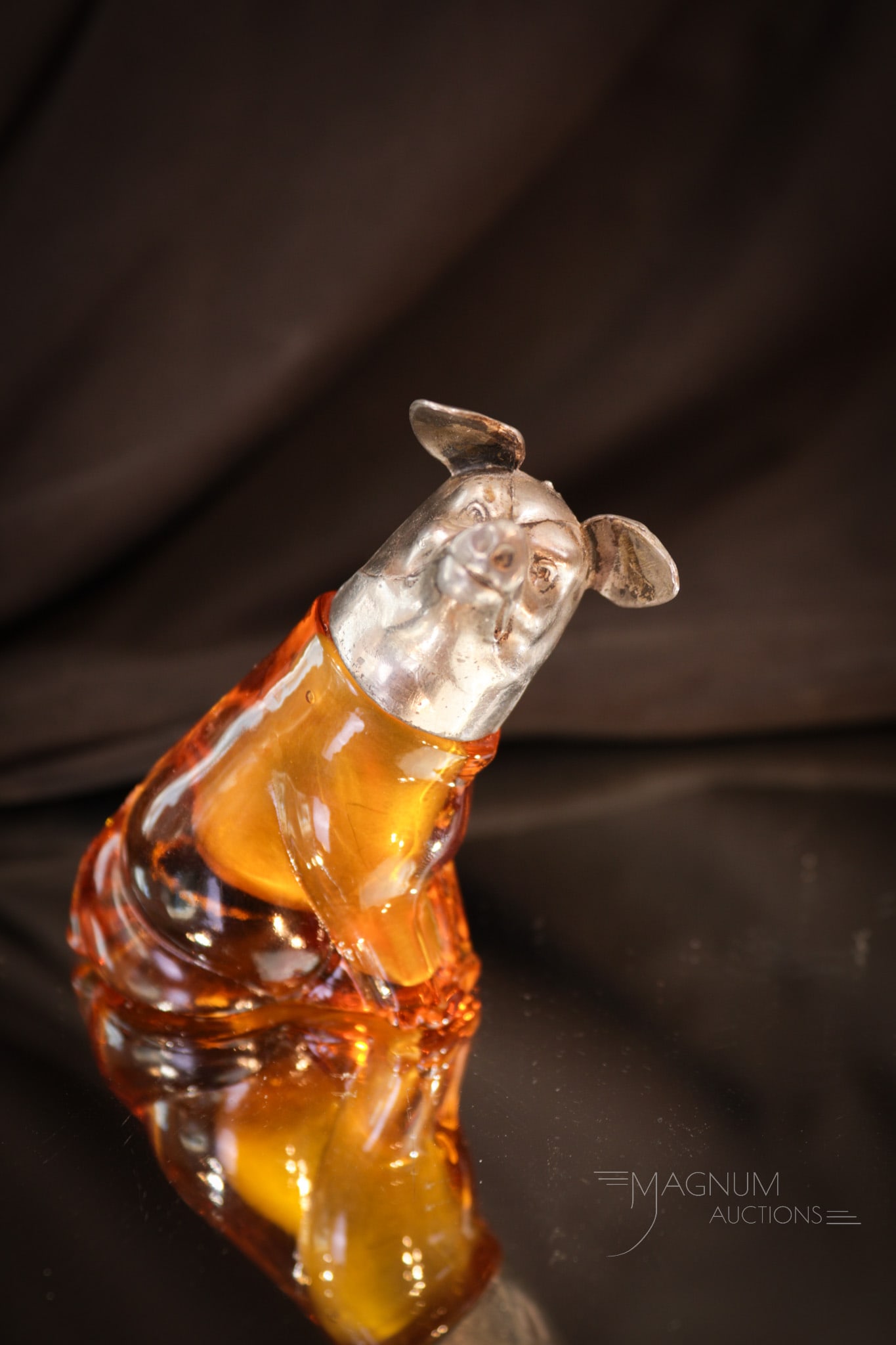 Rare Figural Pig Cased Glass Salt Shaker: This little piggy has come to market! This cute little porker is in amber glass and complete with figural metal lid. Do you see him winking at you? He wants to come home. Bring this little piggy home!
