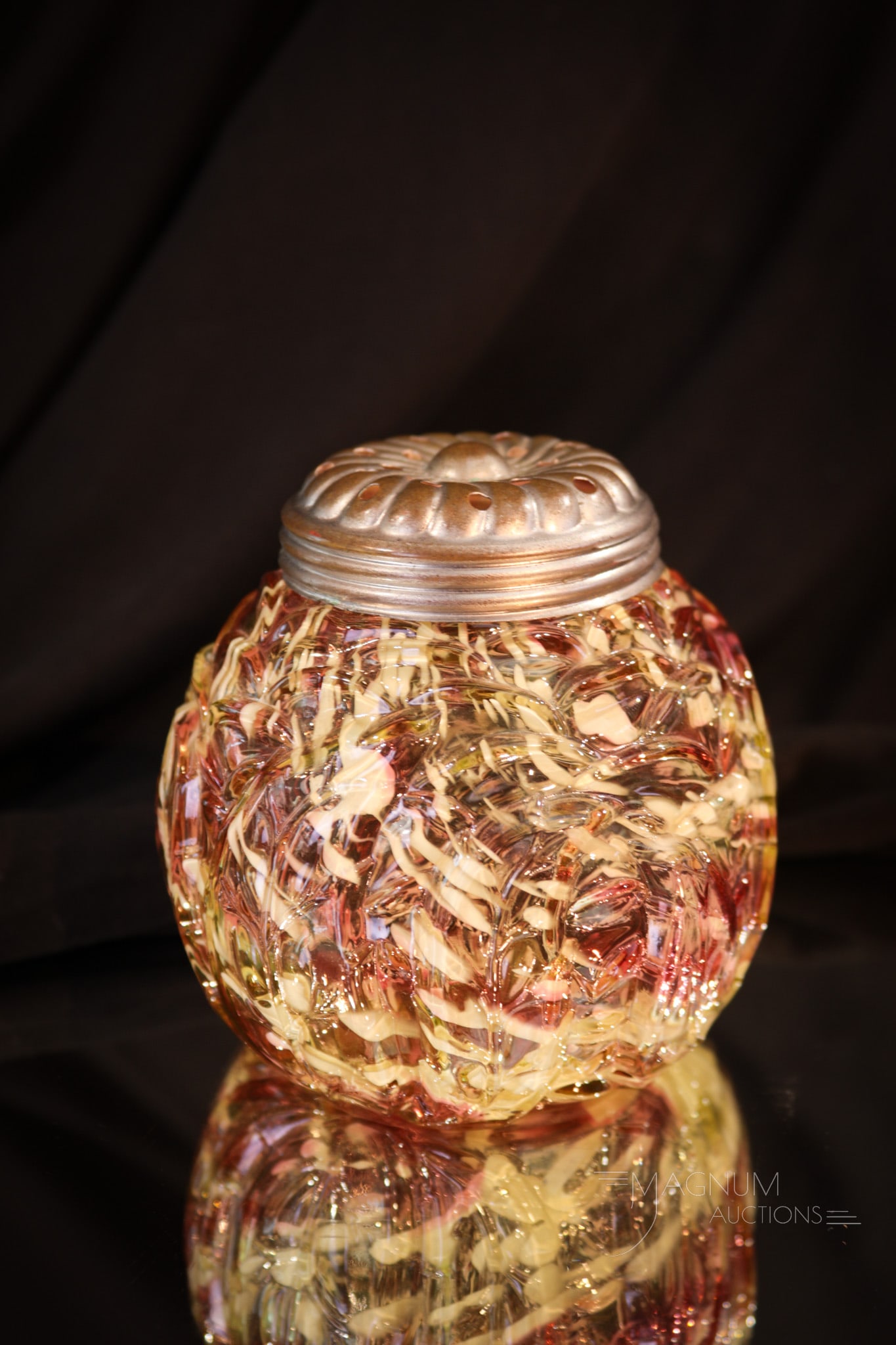 Northwood Vaseline Cranberry Spatter Leaf Mold Sugar Shaker: Always a delight to see one! This beautiful sugar shaker is by Northwood and is the Leaf Mold pattern. Vaseline and cranberry glass with white spatter. Nice collectible shaker. Sugar shaker measures 3