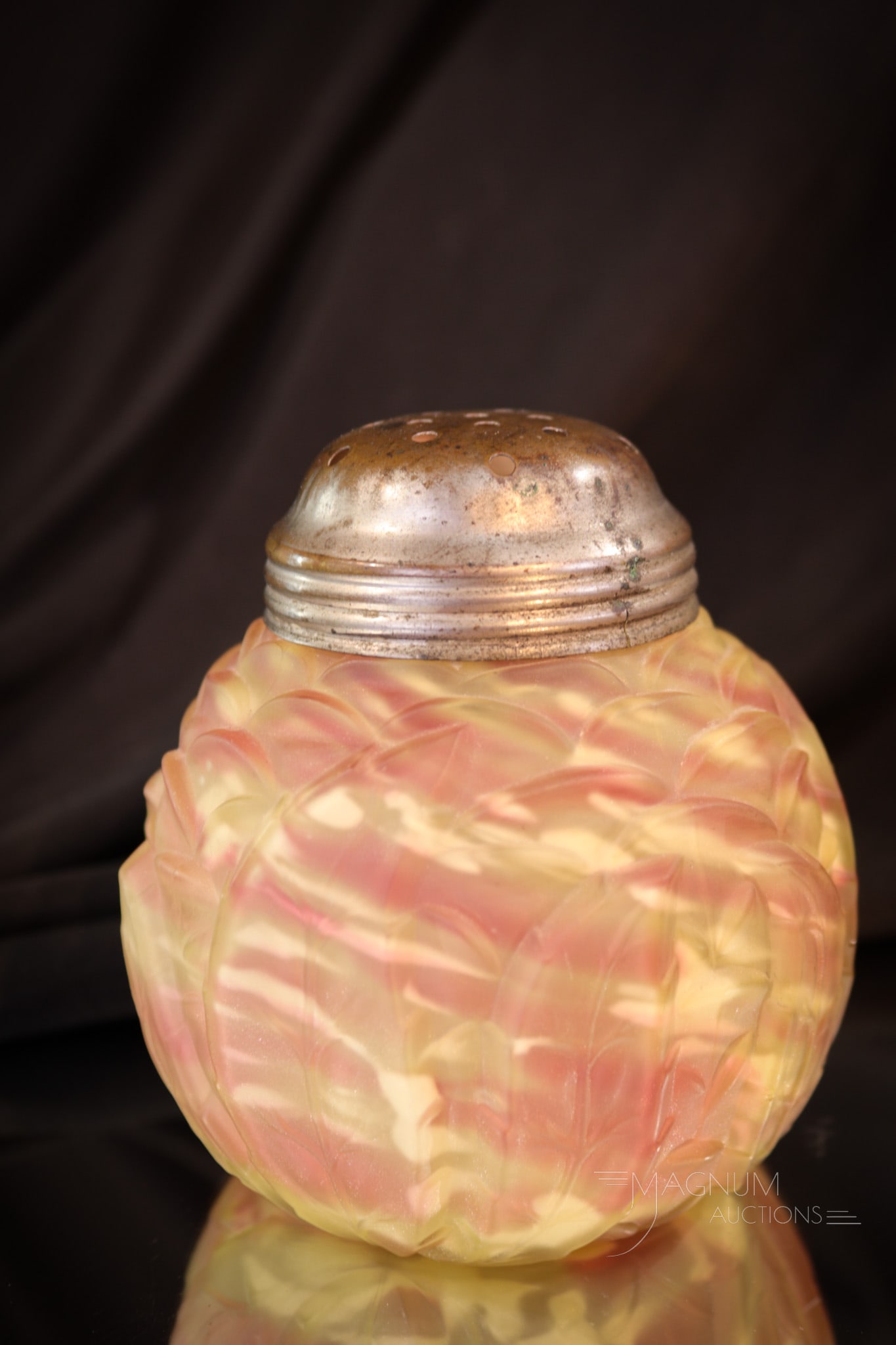 Northwood Leaf Mold Vaseline Cranberry Spatter Sugar Shaker: What a beauty this sugar shaker is. Pretty vaseline and cranberry colored glass with white spatter in a rich satin finish. This sugar shaker measures 4" tall.