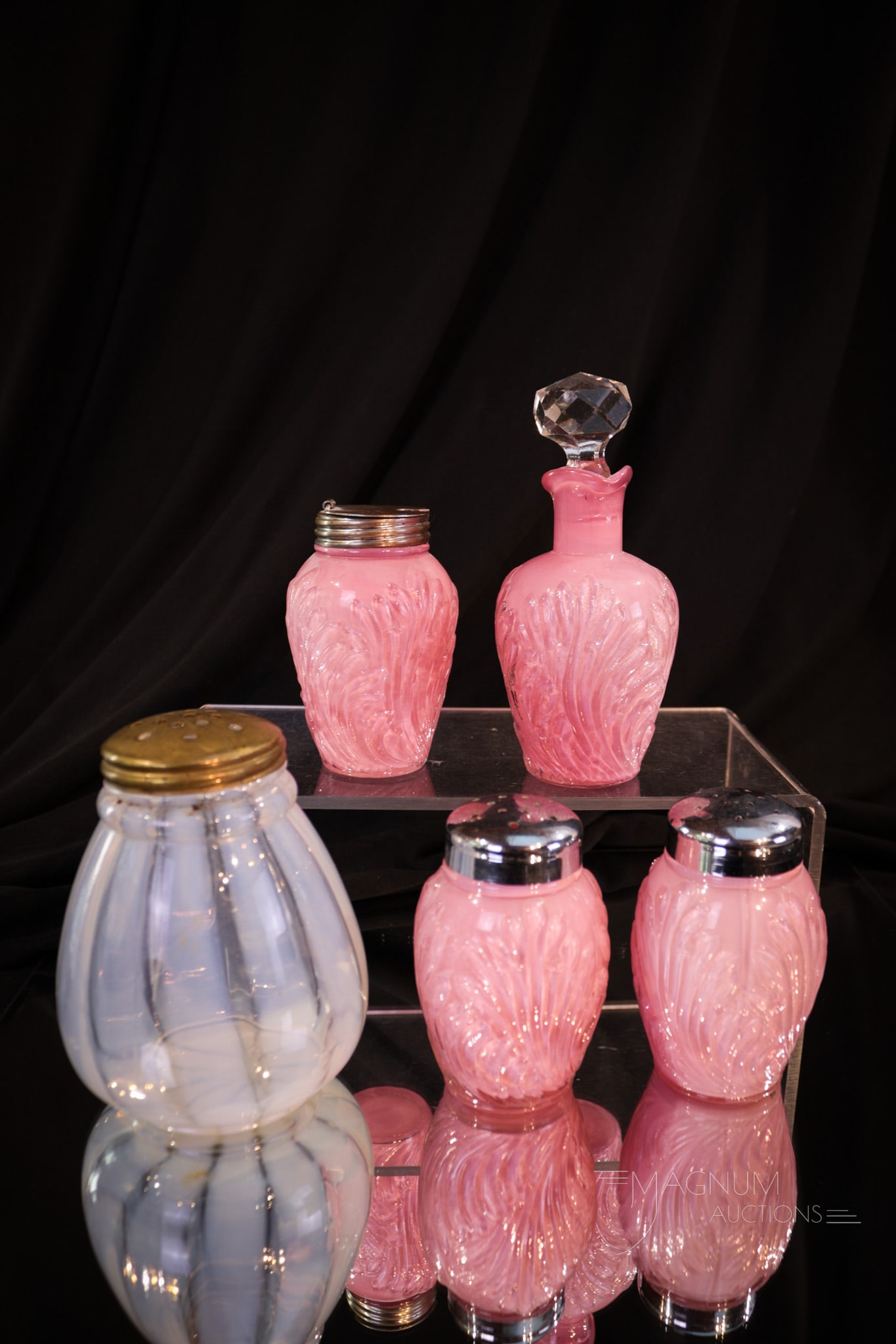 5 pc Lot Fostoria Consolidated Victorian Opalescent & Cased Glass: Five collectible pieces of Victorian Fostoria Consolidated glass. This lot includes an opalescent Wide Stripe pattern sugar shaker along with four pieces of pink cased glass from a condiment set. The 