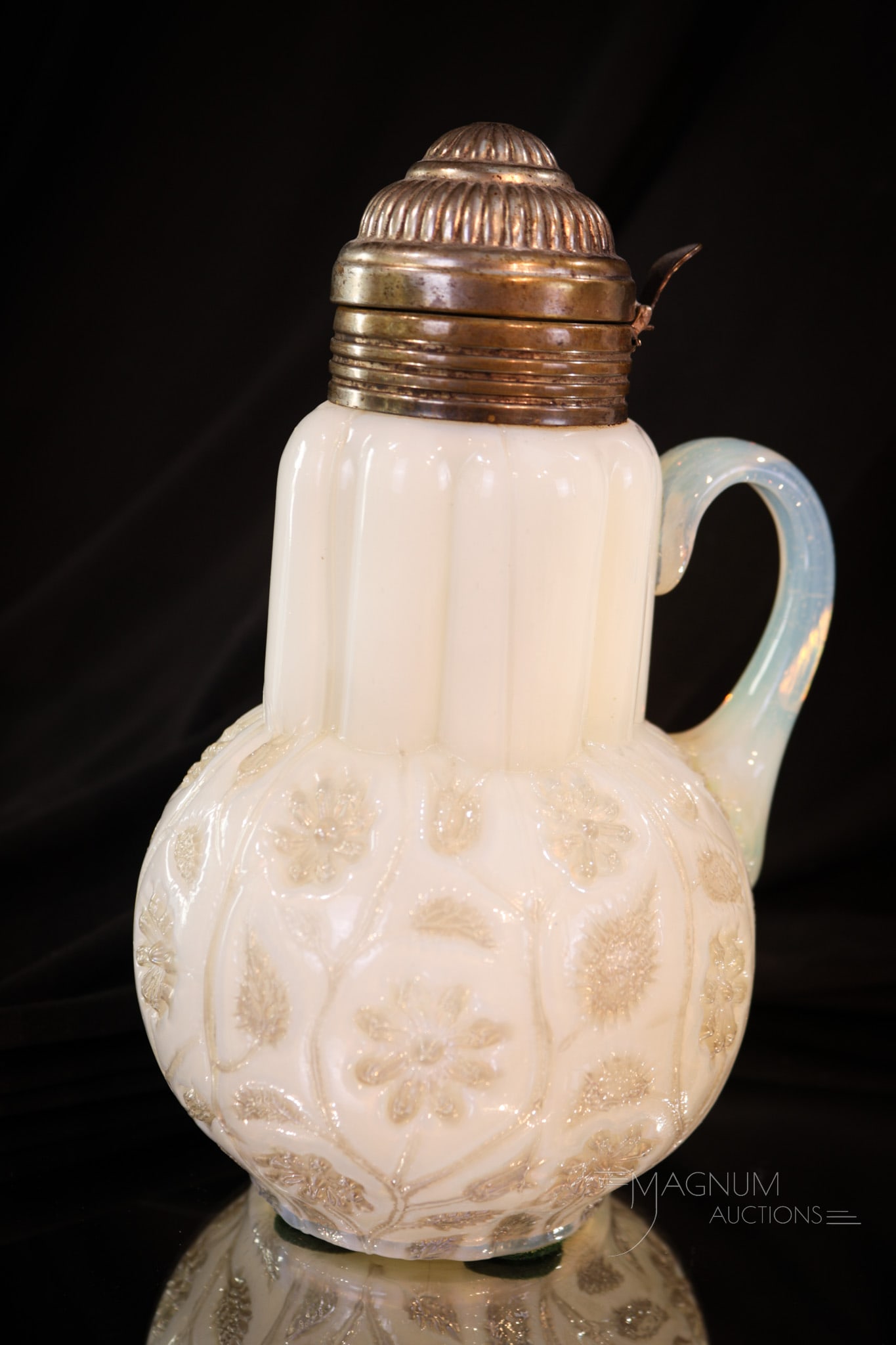 Findlay Onyx Victorian Glass Syrup Pitcher: Classic find in the form of a syrup pitcher. This Findlay Onyx syrup pitcher has fine coloring and is a welcome addition to any collection. Syrup measures 7" tall.