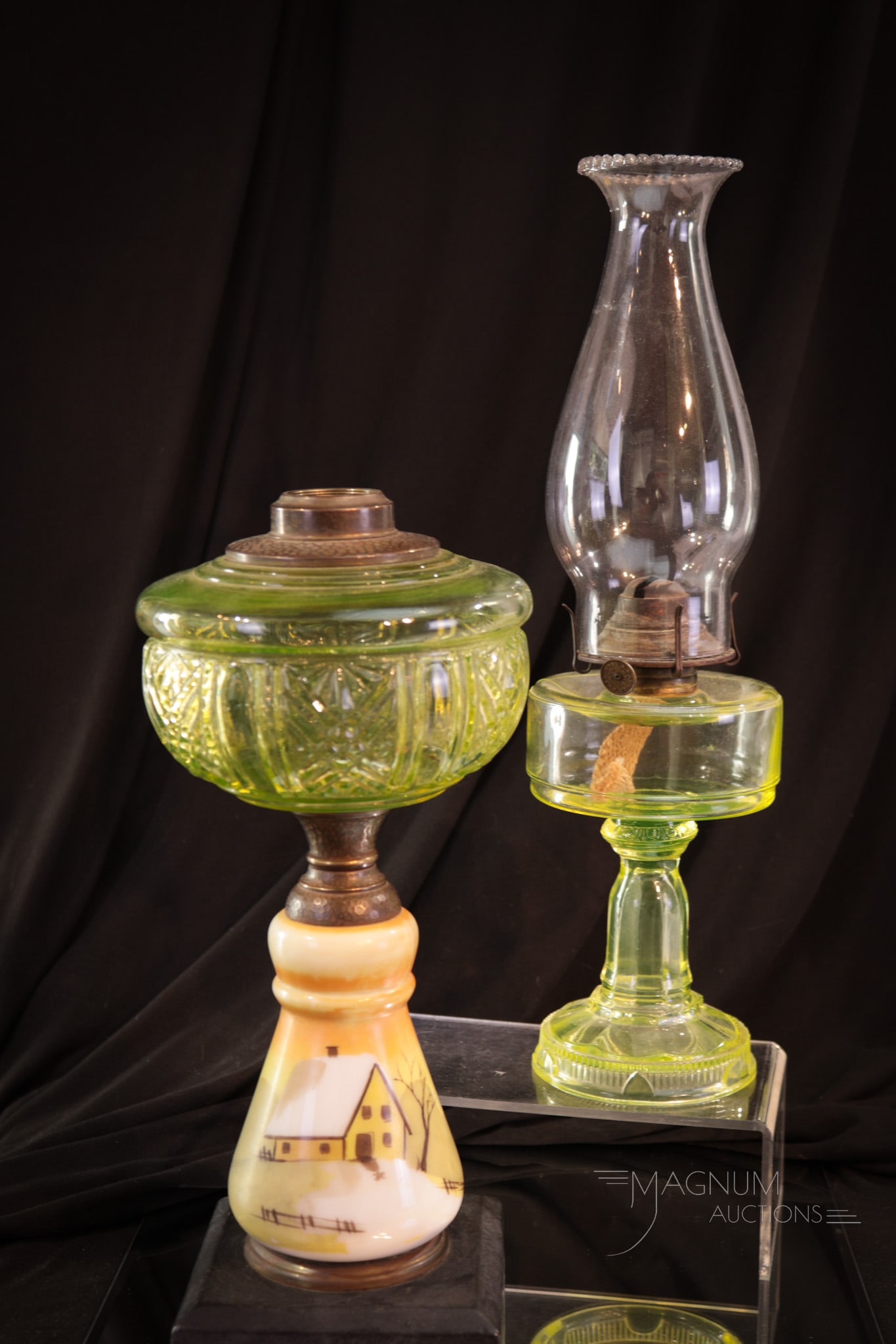 2 pc Lot Victorian Vaseline Glass Oil Lamps: Two fine examples of Victorian vaseline glass oil lamps. The first is a pattern glass example in solid vaseline glass. The second, is a composite oil lamp with vaseline font and cabin in the snow hand