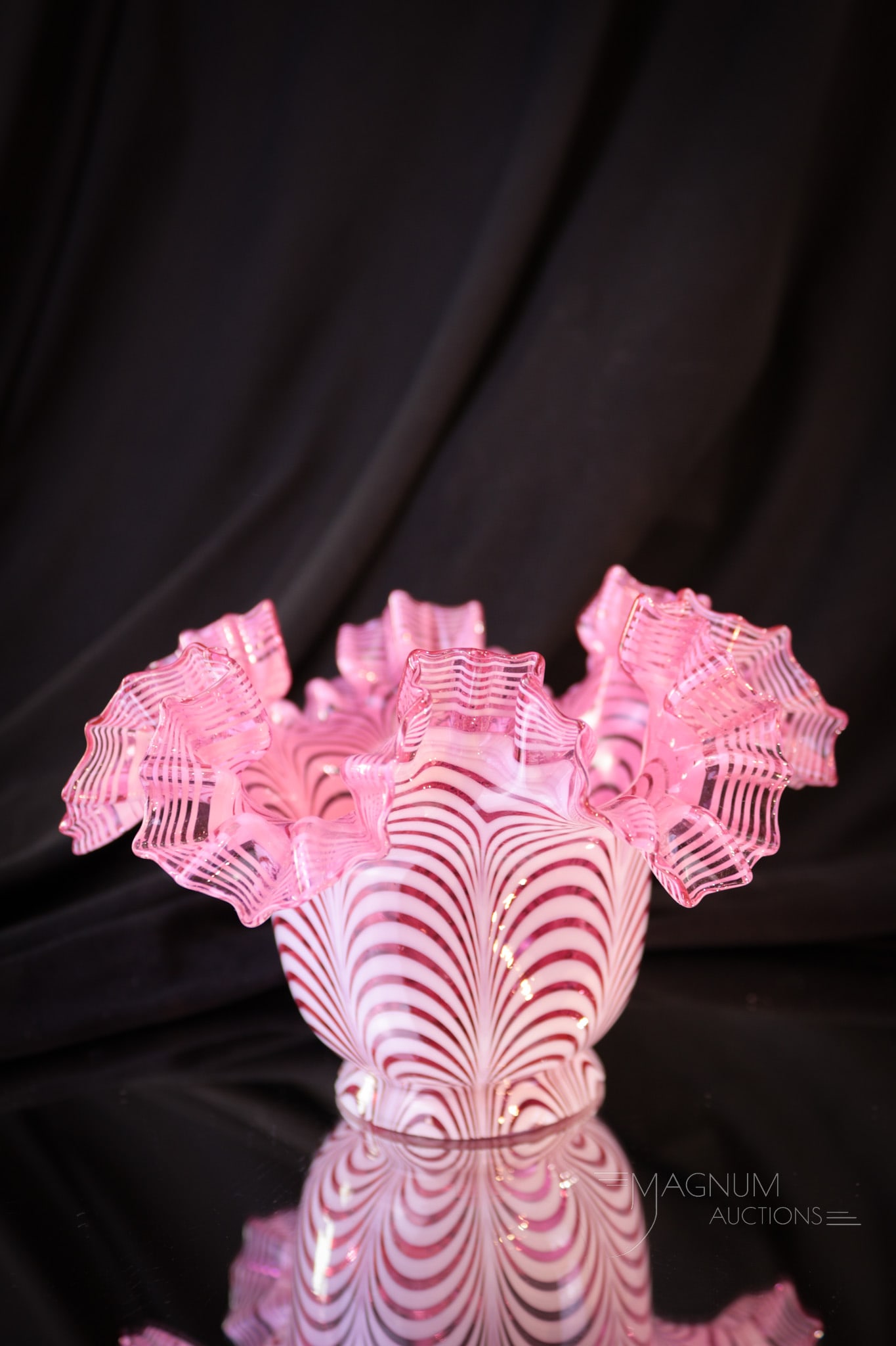 Cranberry Glossy Nailsea Victorian Glass Lamp Shade: Another fine cranberry Nailsea patterned lamp shade in our line up of shades and lamps. This one in glossy cranberry glass. Shade measures 4" tall, 6 1/2" wide, and a 2 1/4" fitter.
