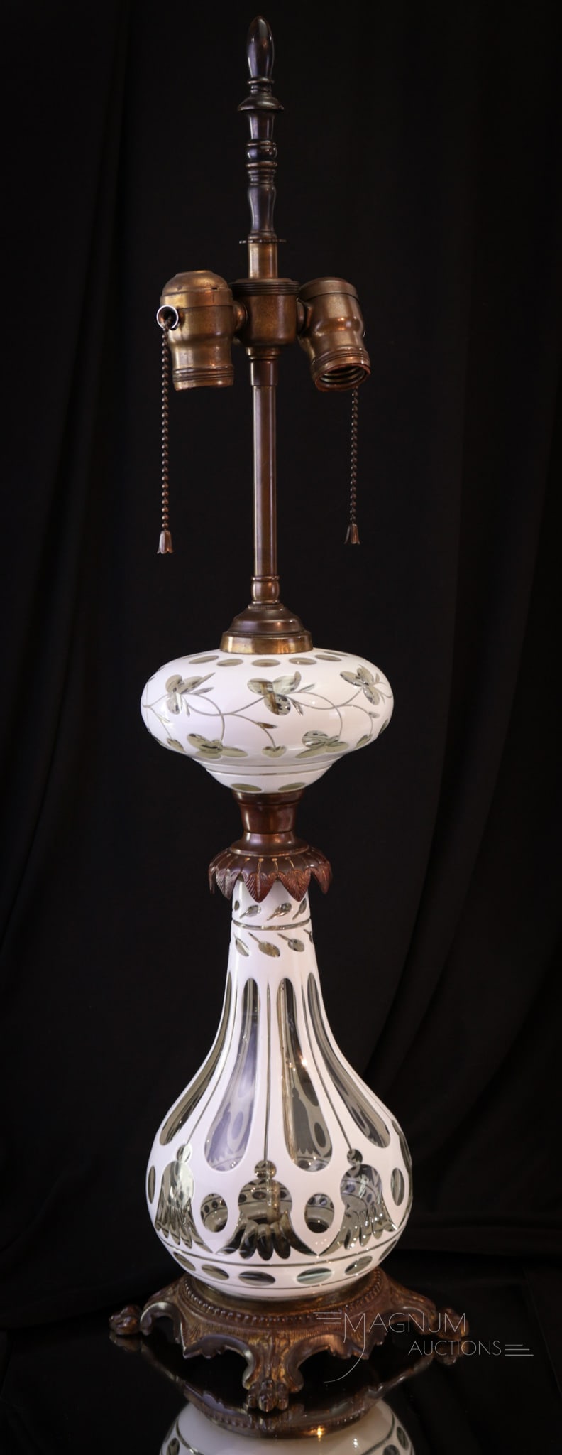 Cut Overlay Glass Antique Table Lamp: Gorgeous antique cut overlay antique lamp. This lamp complete with original hardware is simply understated elegance. Crisp white glass cut back to clear panels. Original patina found to fittings. A mu