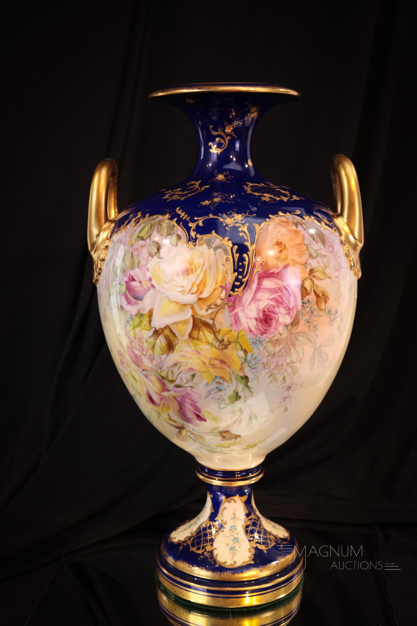 Royal Bonn Cobalt Gilt Decorated Porcelain 17" Vase: Impressive cobalt and gold decorated signed Royal Bonn double handle vase. Vase measures an impressive 17" tall and 8 1/2" wide.