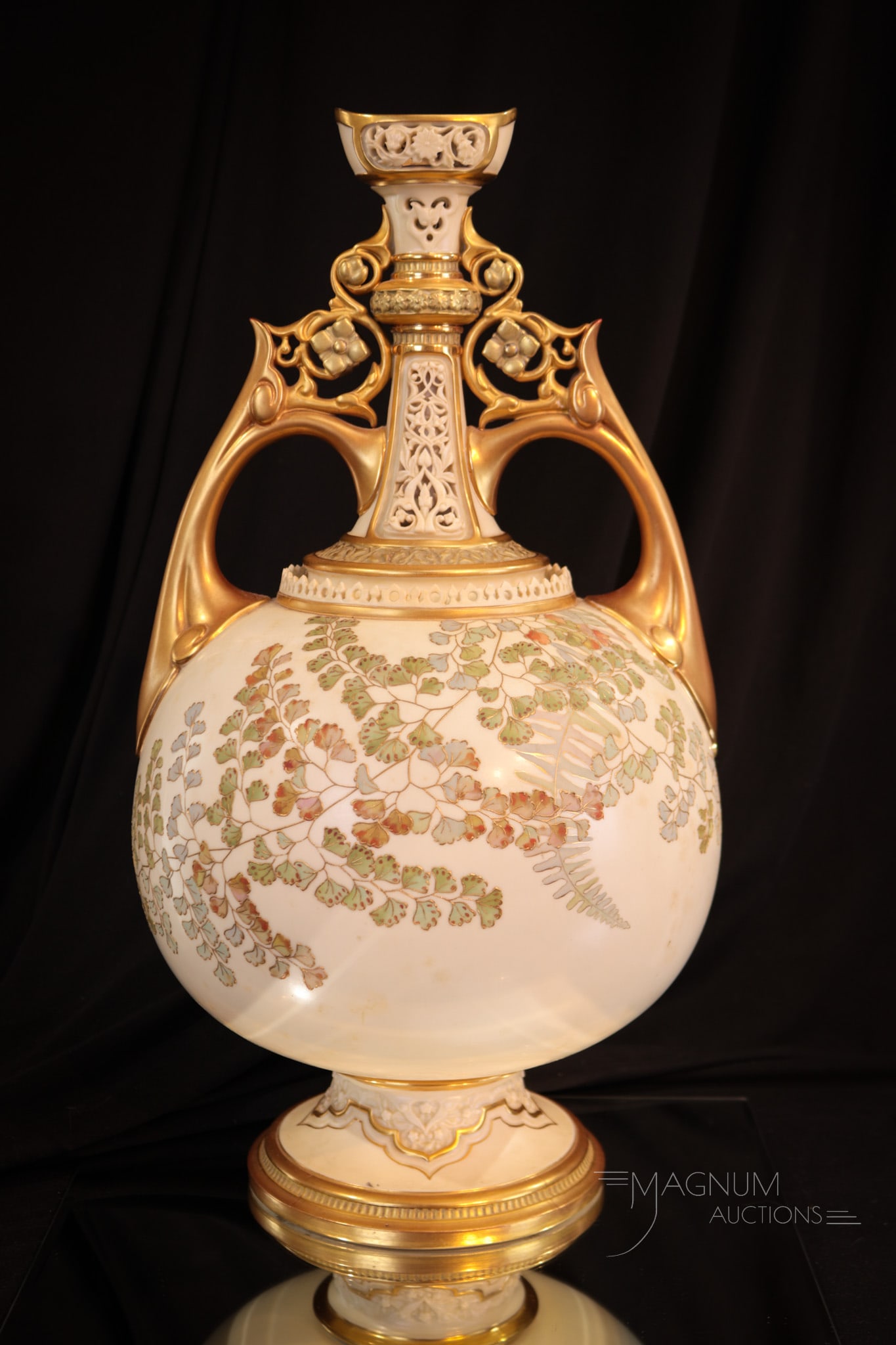 Marked Royal Worcester Monumental 17" Reticulated Vase: Fine marked Royal Worcester monumental 17 1/4 " tall reticulated vase in ivory with gold and an abundance of ferns decorating the body.