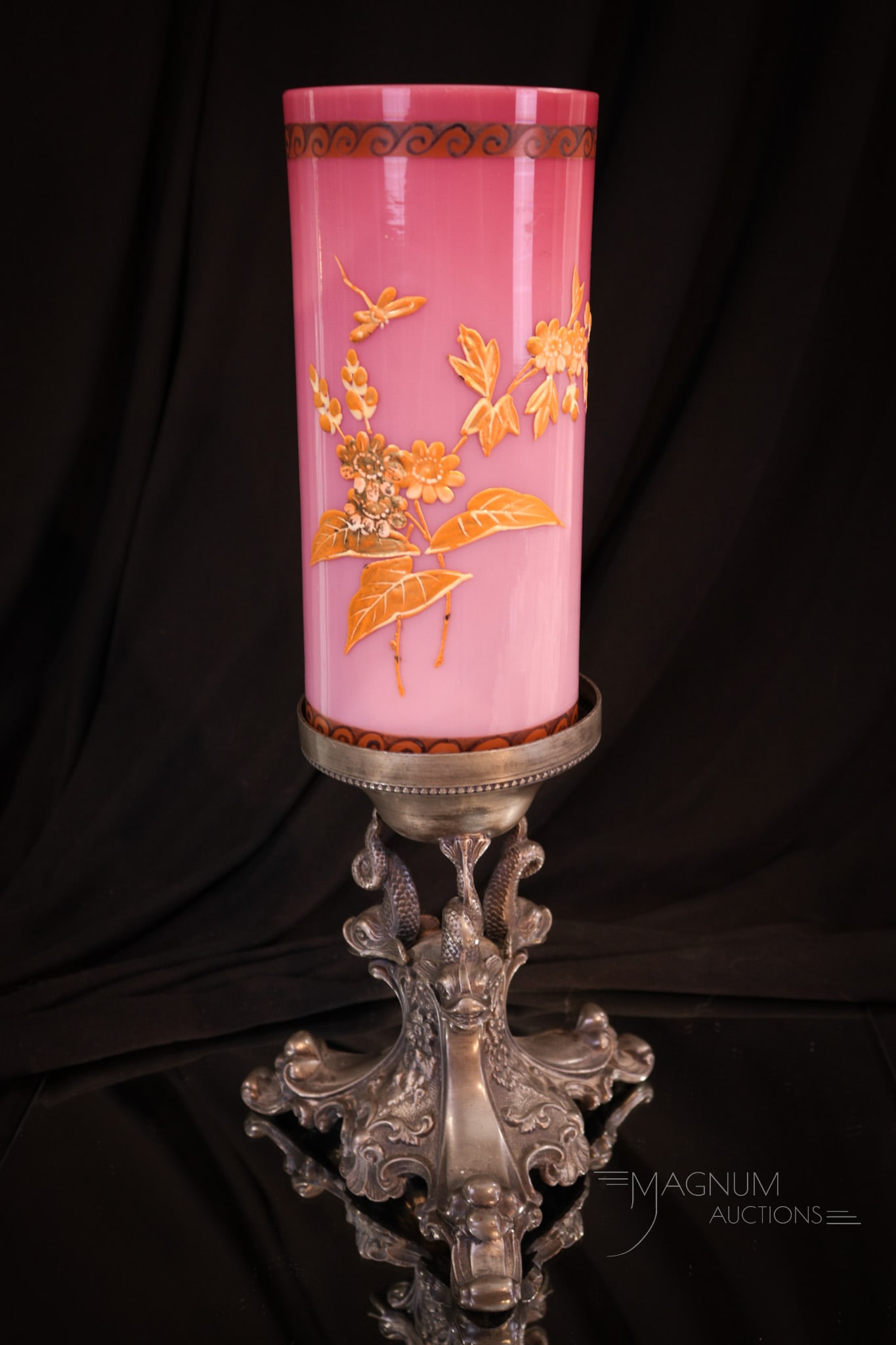 Peachblow Victorian Cased Glass & Figural Silverplate Vase: Beautiful peachblow cased Victorian glass cylinder vase set in unmarked silverplate figural dolphin holder. Complete this lovely measures 12 1/2" tall.