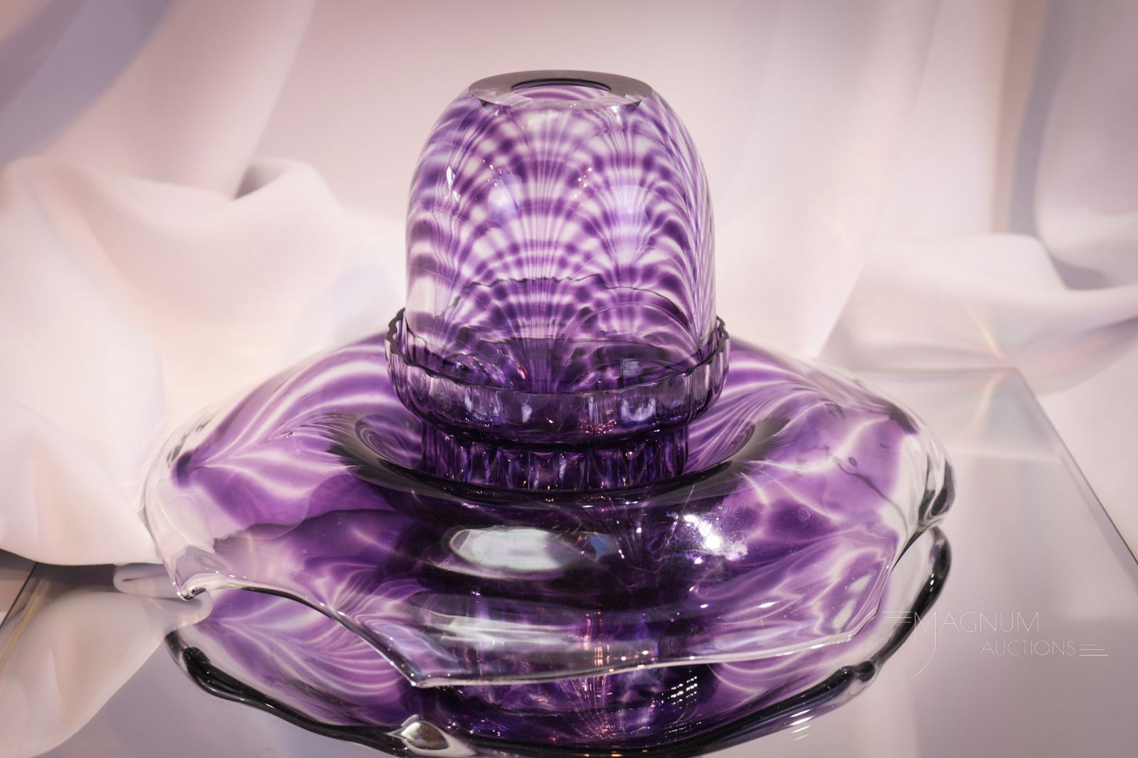 Lorio Furnaces Studio Glass 3 pc Fairy lamp: Deep amythest pulled feather design is found in this three part fairy lamp. Piece is numbered #208/300 and is signed by Rio Lorio. Complete the fairy lamp measures 5" tall.