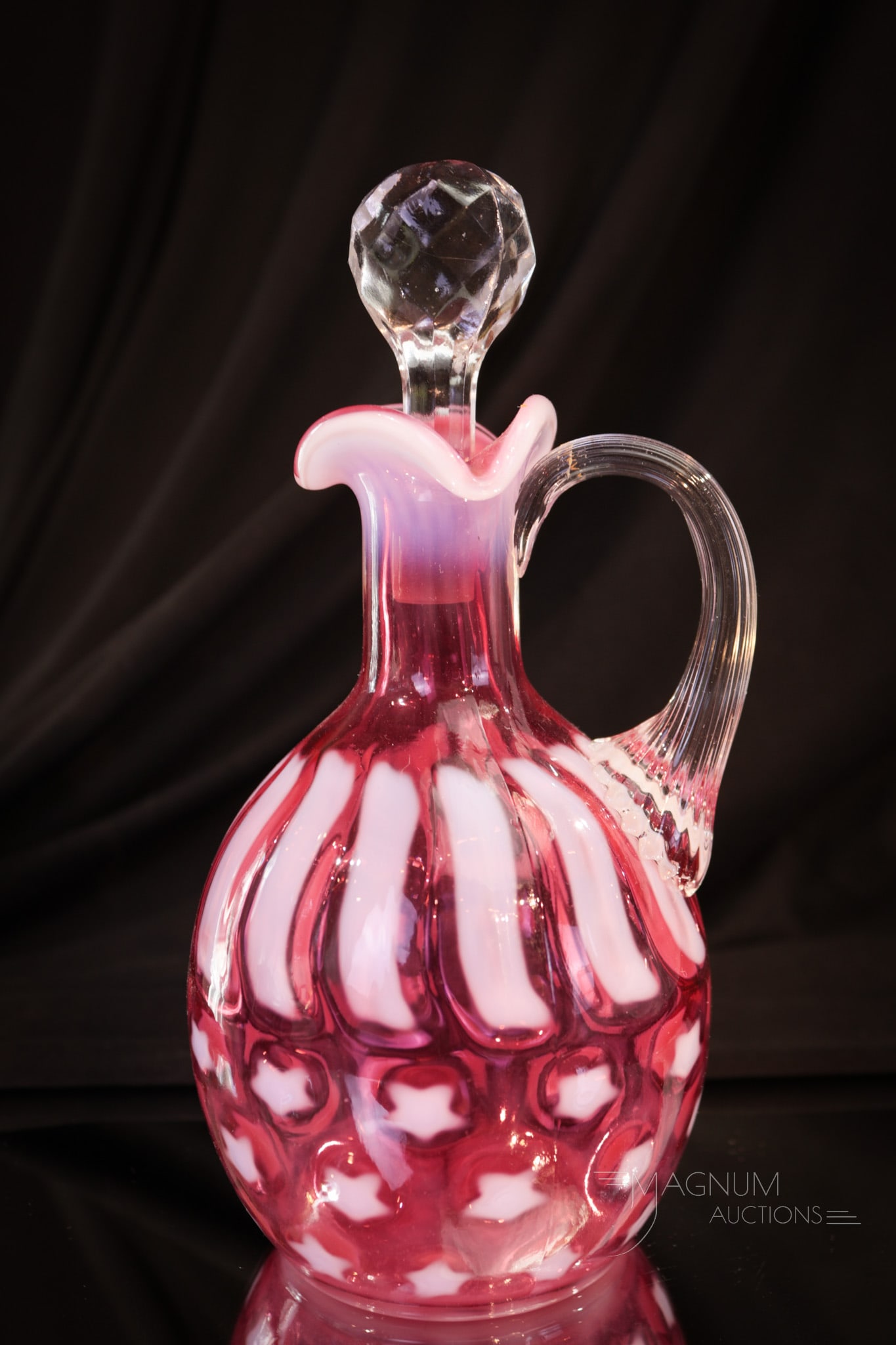 Fenton Wright Cranberry Opalescent Glass Stars & Stripes Cruet: A patriotic beauty here folks. Stand up for the good old Stars and Stripes. This cruet by Fenton for L.G. Wright has extraordinary coloring and opal. Cruet measures 7" tall.