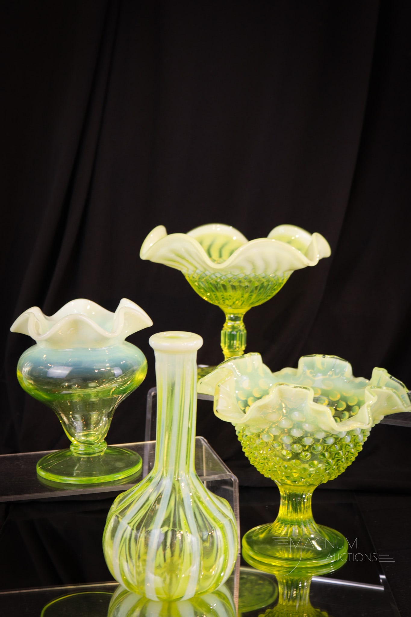4 pc Lot Fenton Topaz Opalescent Vaseline Art Glass: Four select examples of Topaz Fenton vaseline opalescent glass in this lot. This lot is comprised by a Jersey Swirl compote, a Hobnail compote, a footed ruffled vase, and finally a Fenton for Wright R
