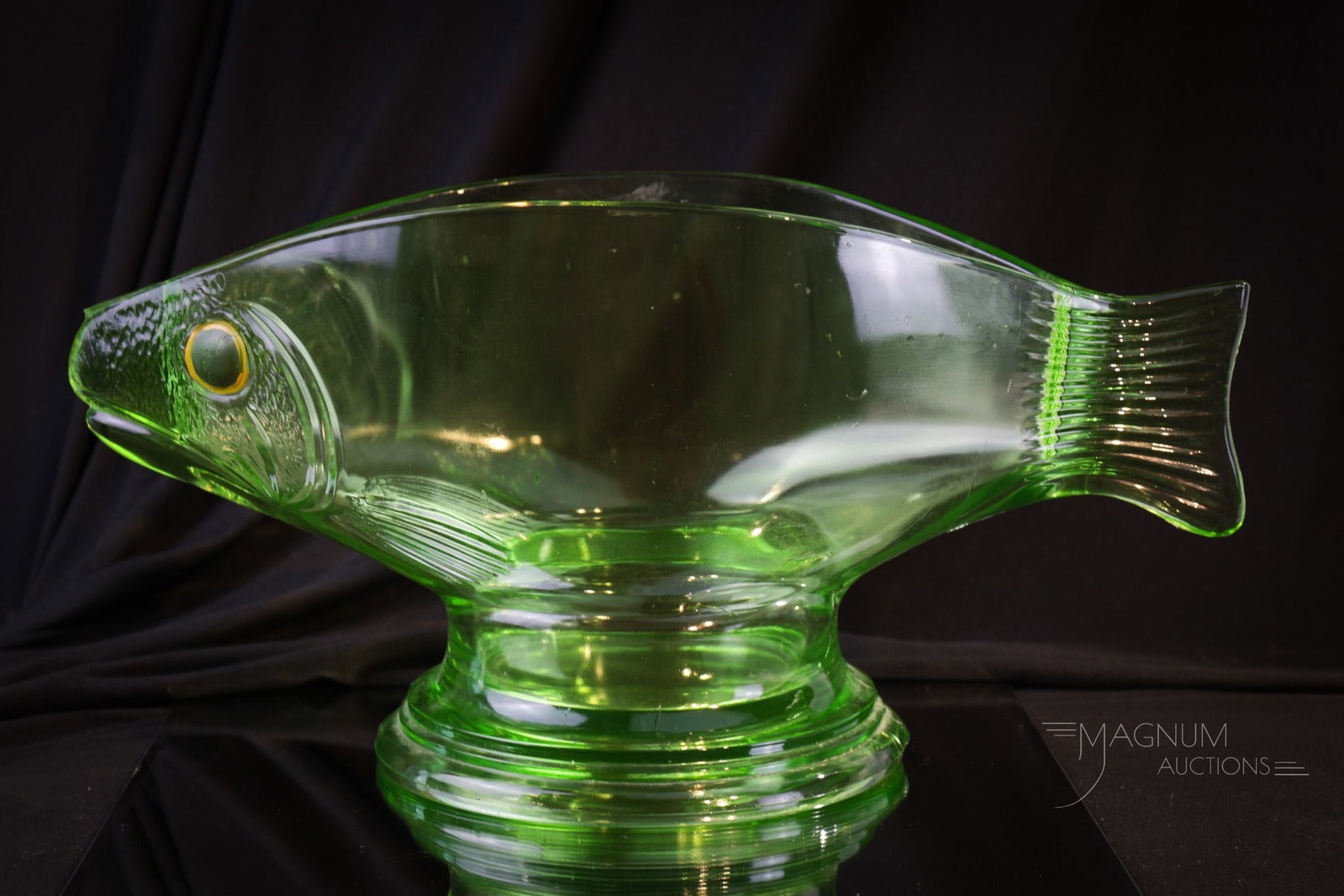 L.E. Smith Kingfish Uranium Glass Fishbowl Aquarium: Super find folks! This Depression era L.E. Smith figural uranium glass Kingfish aquarium is super collectible and seldom found. This one in depression era green. Aquarium measures 7 5/8" tall, 14 3/4"