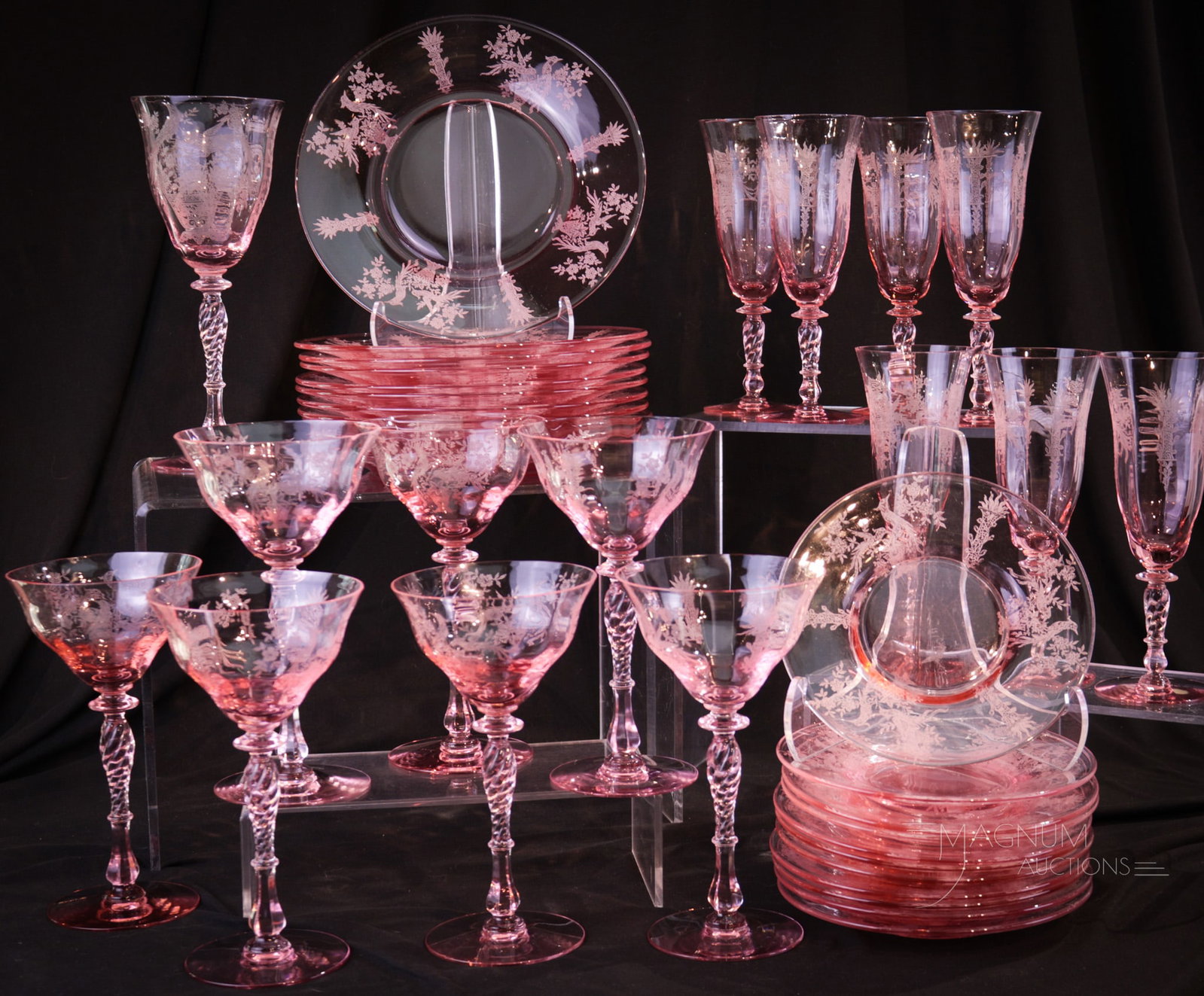 37 pc Lot Pink Tiffin Persian Pheasant Elegant Glass: Thrity-seven fine pieces of Tiffin elegant glass in the Persian Pheasant pattern. A fine assemblage of a beautifully elegant and collectible pattern in pink. Tallest measures 7".