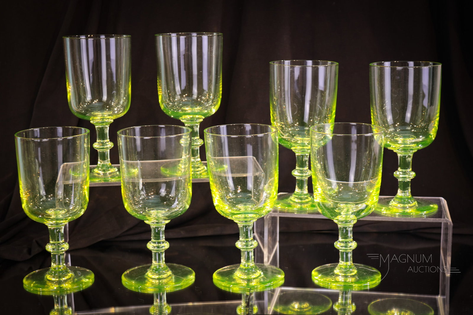 8 pc Set Vaseline Glass Water Goblets: Fine set of eight solid vaseline glass water goblets. Vasies take note of these. Perfect for entertaining! These have vivid vaseline coloring. Each measures 6 1/2" tall.