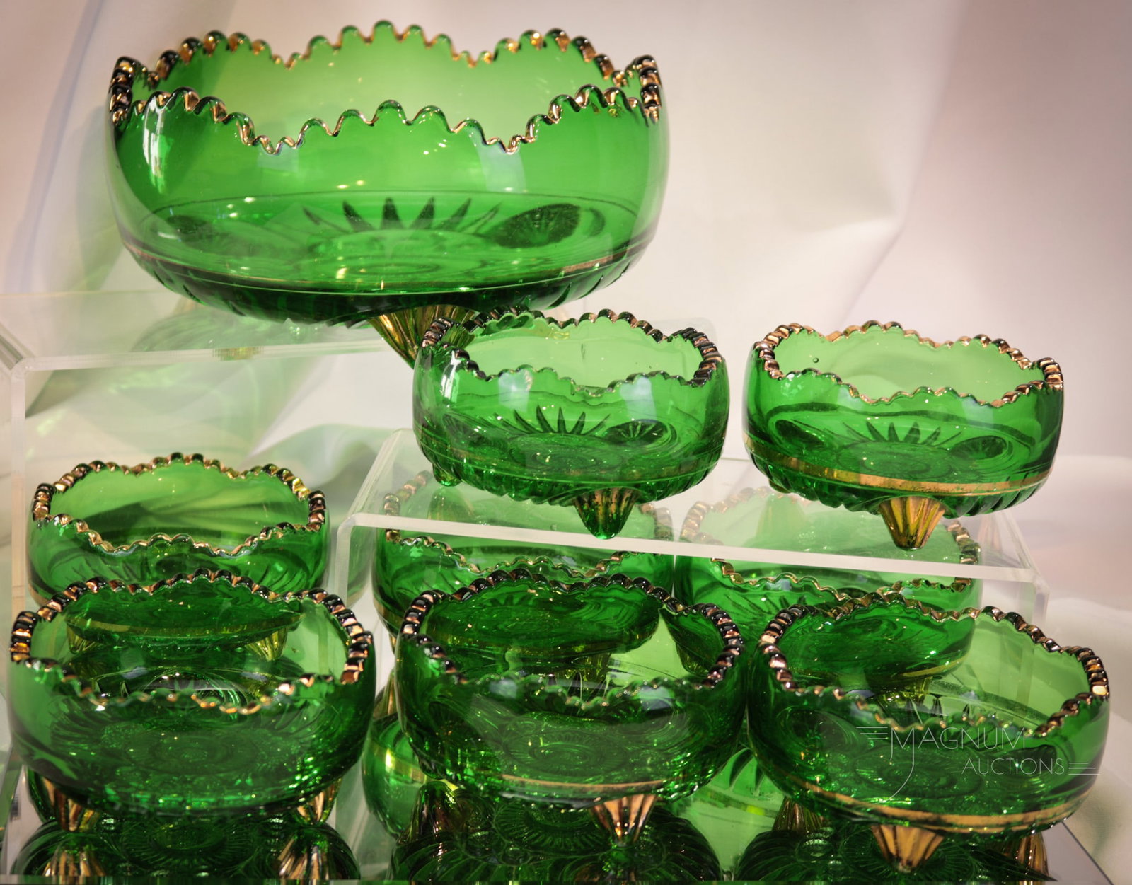 9 pc Lot Riverside Esther Glass Berry Set: Beautiful nine piece berry set by Riverside glass in the Esther pattern. This set in green with gold decorfation. Largest measures 3 1/2" tall, 7 1/2" diameter. Provenance: This item is from the priva