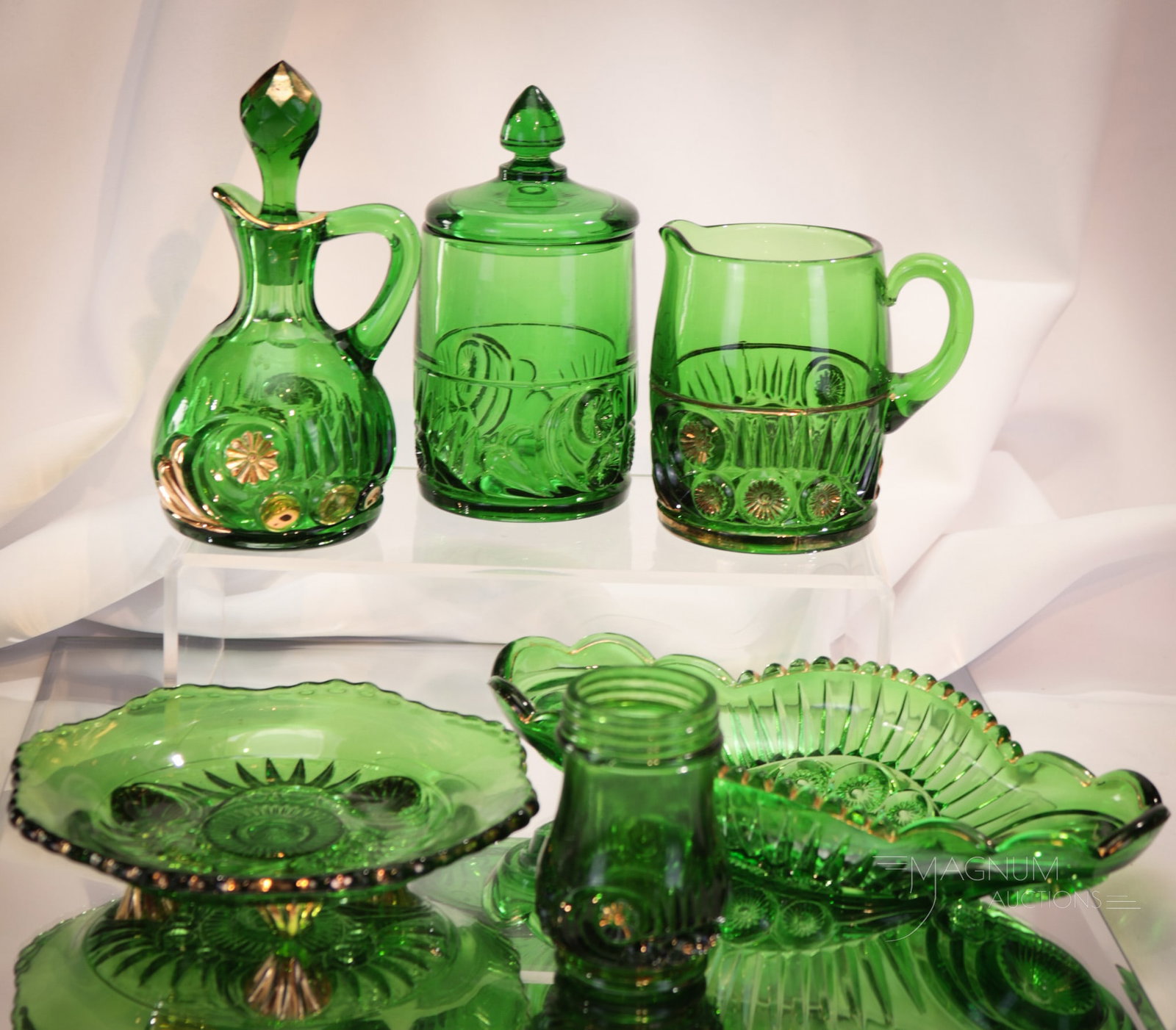 6 pc Lot Riverside Esther Glass: Six fine finds in Riverside Esther pattern glass. Included in this offering is a pickle dish, a 3-footed macaroon dish, small cruet, shaker without lid and a breakfast size creamer and covered sugar b