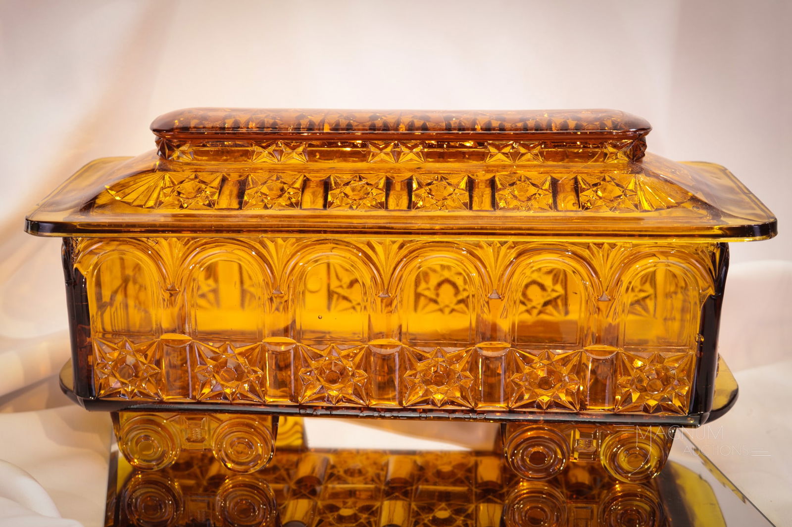 Rare Bellaire Goblet Co. Amber Train Car Cookie Jar: Wonderfully rare find in this Bellaire Goblet Co. amber Victorian glass train car cookie jar complete with lid. This is a seldom seen example and must-have piece for sure. Train car measures 6 1/2" ta