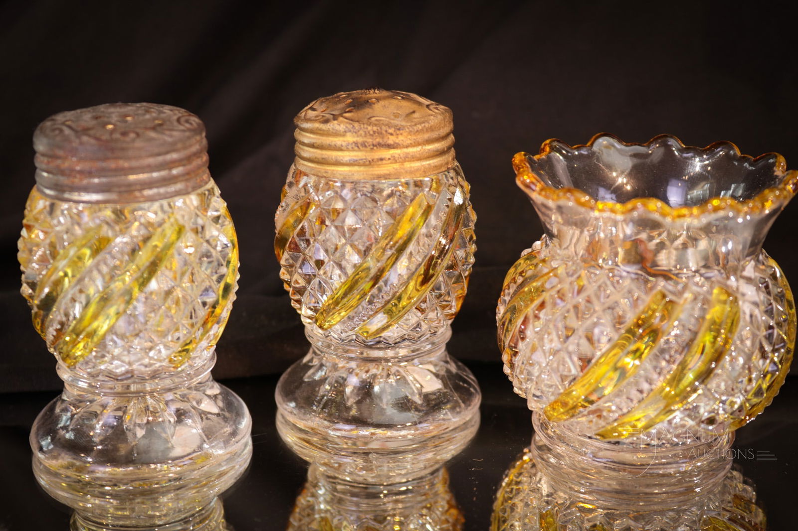 3 pc Lot Amber Stained Victorian Glass Zipper Swirl Toothpick Holder & Shakers: Three fine examples of amber stained Victorian glass in the Zipper Swirl pattern. This lot is made up of a toothpick holder along with a pair of shakers. Tallest measures 3".