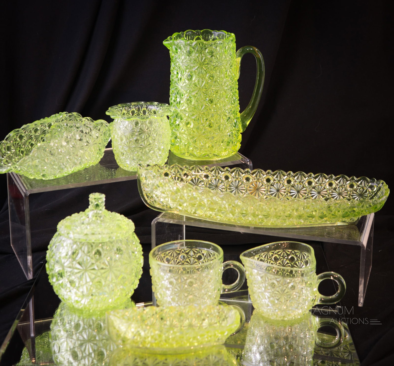 8 pc Lot Victorian Vaseline Daisy & Button Glass: Vasies stand up and take note of this fine offering of vaseline Victorian Daisy & Button glass. Lot is comprised by a canoe, a canoe salt, bowl, cup, creamer,toothpick, covered sugar, and a cream pitc