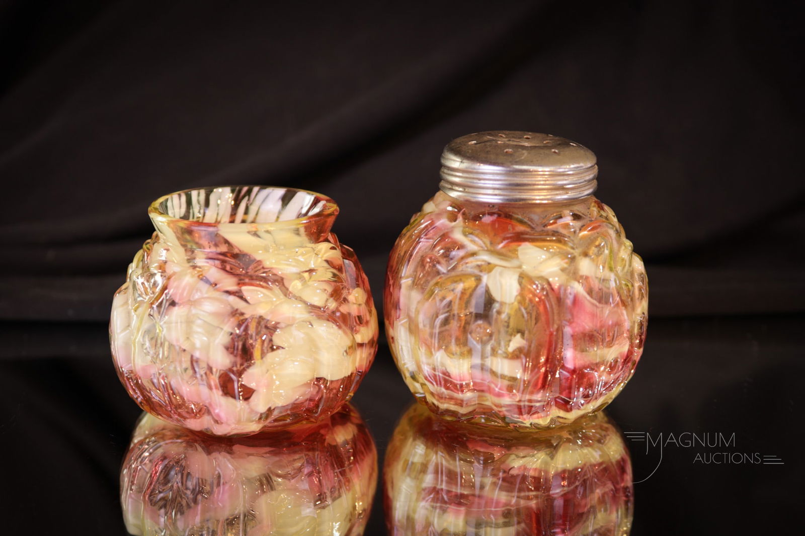 2 pc Lot Northwood Leaf Mold Cranberry Vaseline Glass Shaker & Toothpick Holder: Two extra fine example of the Northwood Leaf Mold pattern in cranberry vaseline with white spatter. This lot offers a shaker along with a toothpick holder. Each with super color. Tallest measures 2 1/