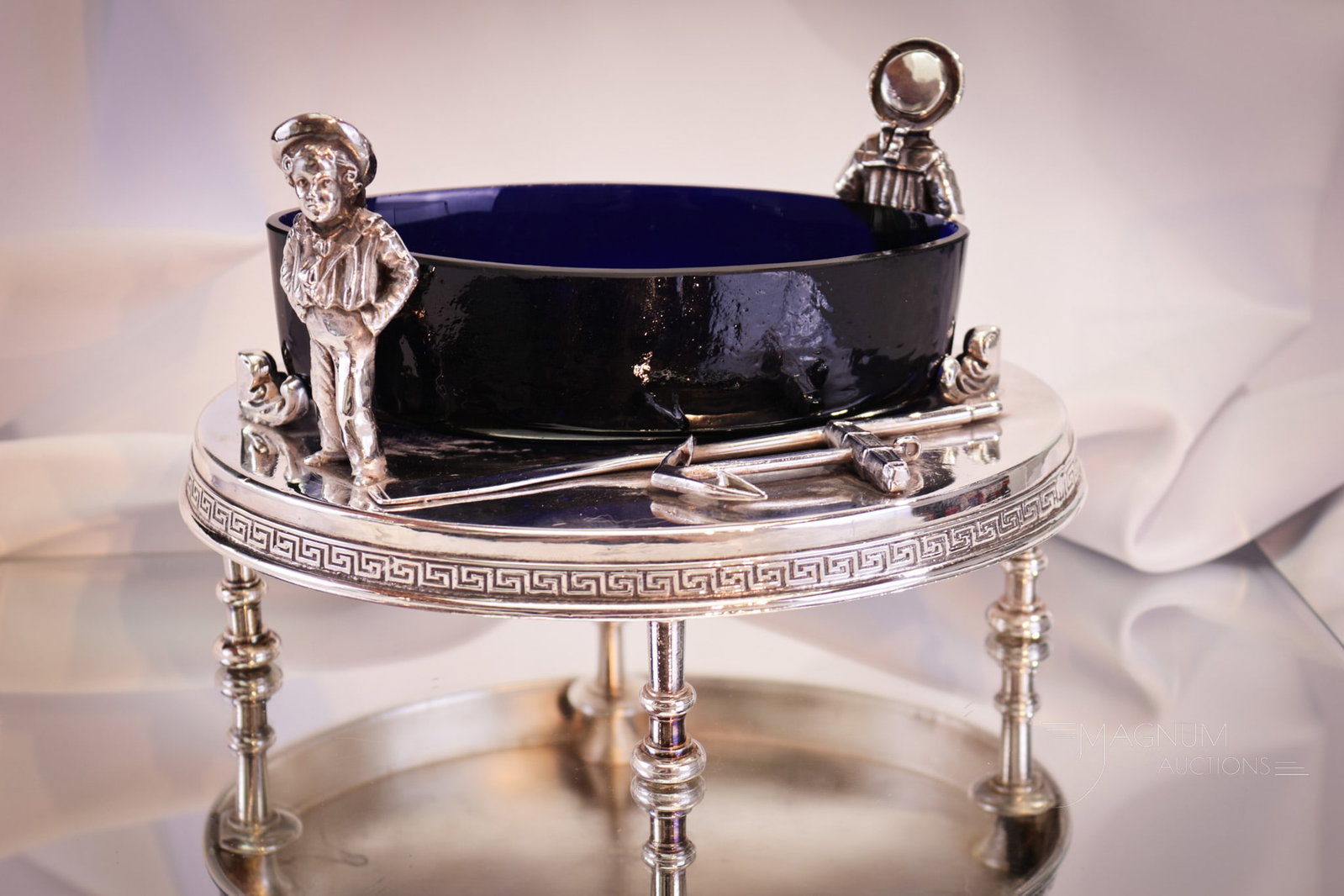 Starr & Marcus Victorian Figural Silver Plate Cobalt Glass: Finely detailed Victorian signed Starr & Marcus silver plate figural holder complete with original cobalt glass canoe insert. Holder features a nautical motif along with two lads in sailor outfits. Pi