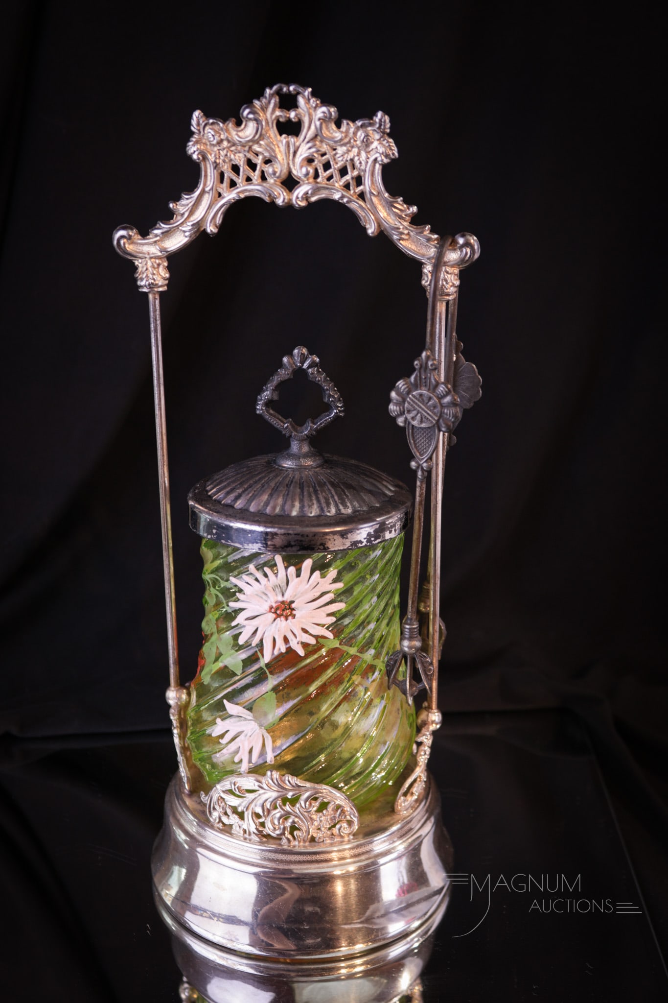 Eagle Silverplate Victorian Vaseline Mt. Washington Glass Pickle castor: A fine Victorian pickle castor. The glass is a rare Mt. Washington vaseline enameled swirl glass with fuji mums. The frame is signed Eagle silverplate. Together this is one wonderful pickle castor. Pi