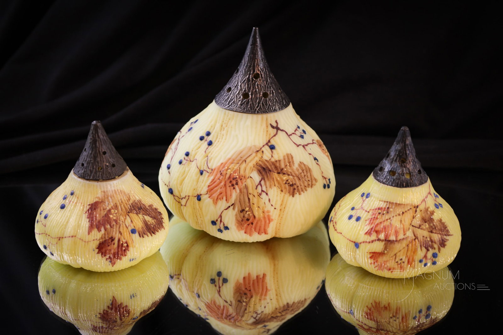 3 pc Set Mt. Washington Fig Sugar & Salt Shaker Set: Three fine examples of Mt. Washington fig shakers. One sugar shaker along with similar decoration salt and pepper. The sugar shaker is unfired burmese glass while the salt shakers are not. Each with b