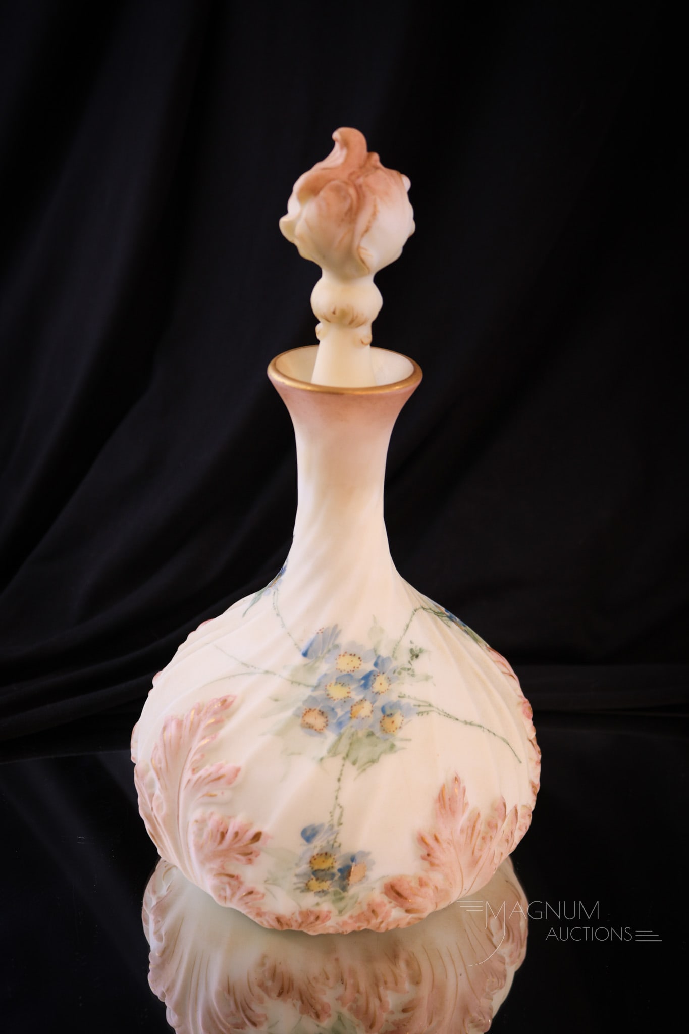 Mt. Washington Enameled satin Glass Cologne Bottle: Gorgeous satin enameled glass Mt. Washington cologne bottle with acanthus leaf motif molded body and stopper. This fine example is marvelous with floral decora around the body. Complete with stopper i