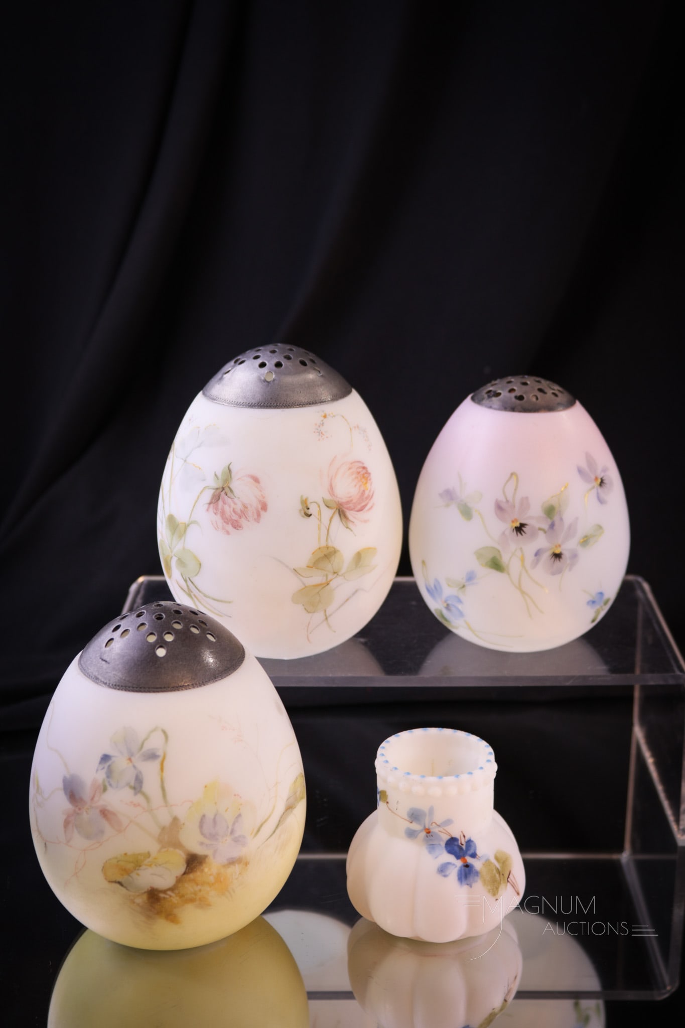 4 pc Lot Mt. Washington Glass Egg Sugar Shakers & More: Three fine and select examples of Mt. Washington Victorian glass sugar shakers along with a Libbey lobed lusterless toothpick holder. Each is a collection enhancing find. Tallest measures 4".