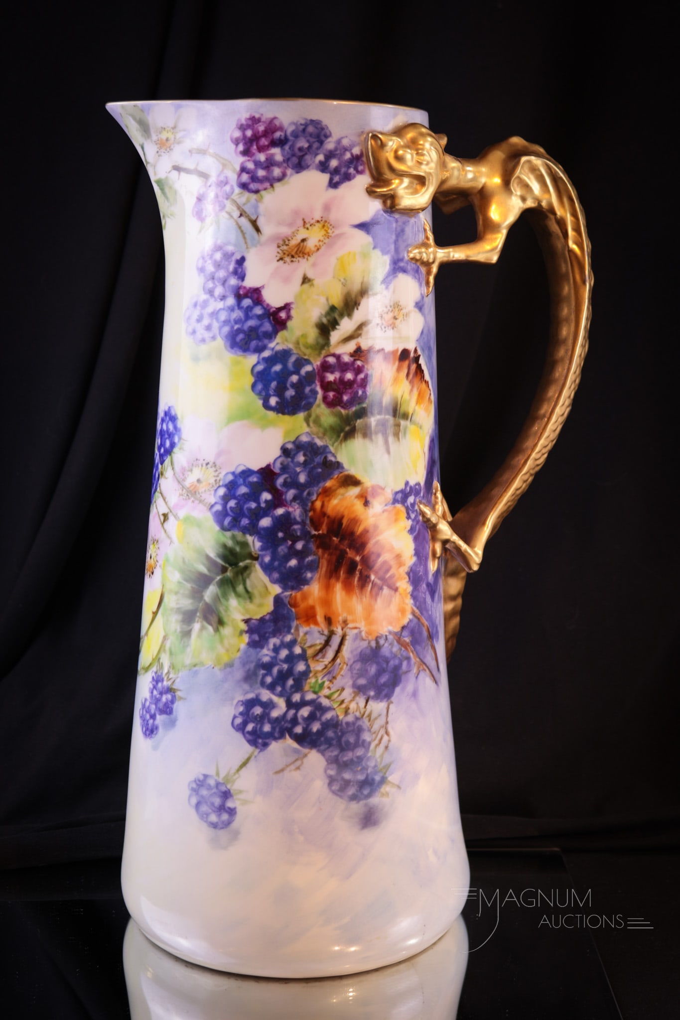 Hand Painted Porcelain Blackberry Dragon handle 15" Tankard Pitcher: Amazing hand painted porcelain tankard pitcher featuring a dragon handle. This piece is adorned with blackberry sprays and blooms with foliage. Brilliant colors and lots of gold. Tankard measures a st