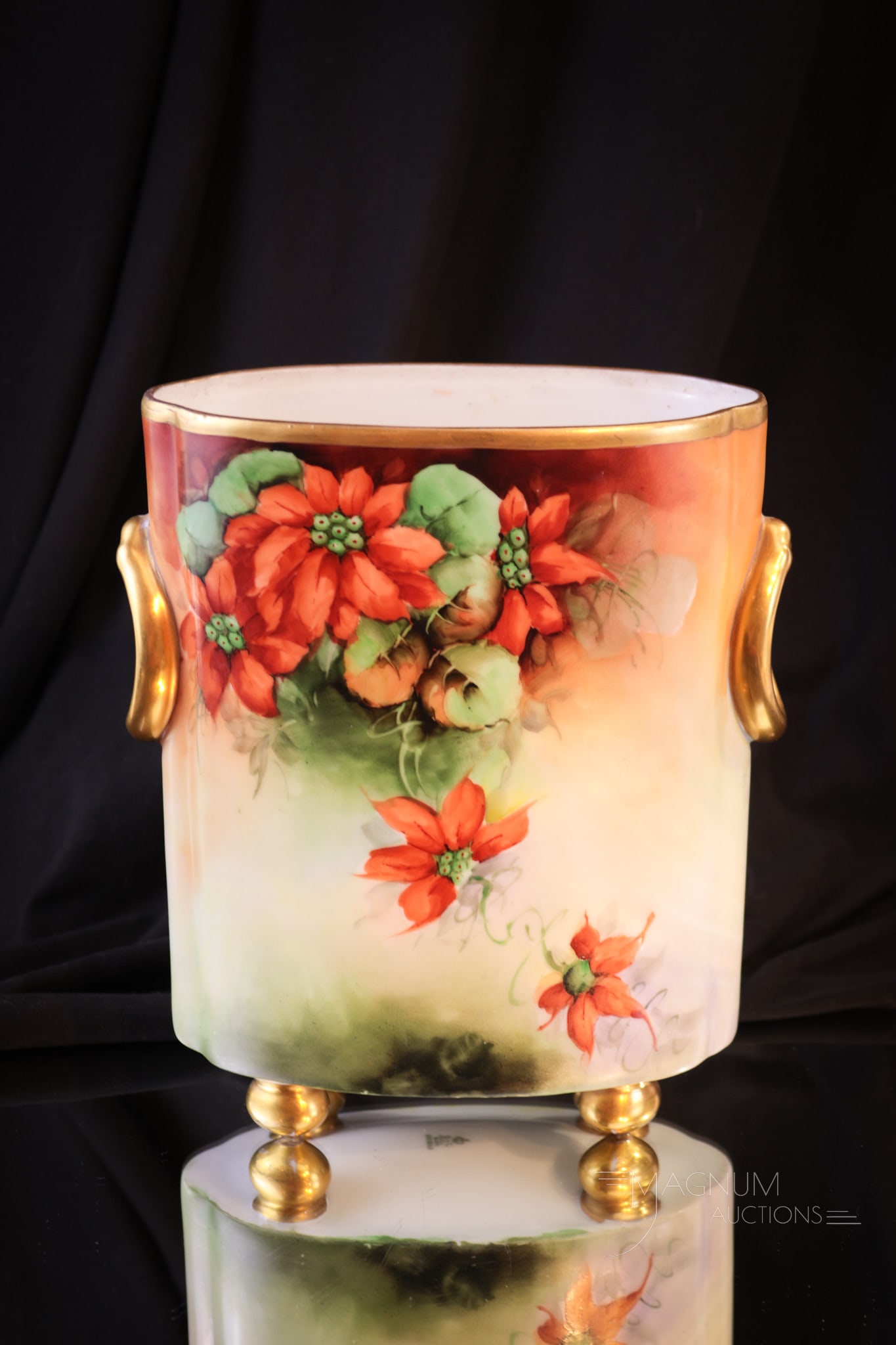 H & Co. Bavaria Hand Painted Porcelain Poinsettia Cache' Pot: How appropriate for this time of year with Christmas right around the corner. This beautiful cache' pot is decorated with red poinsettia flowers and lots of gold. Piece measures 8 1/4" tall.