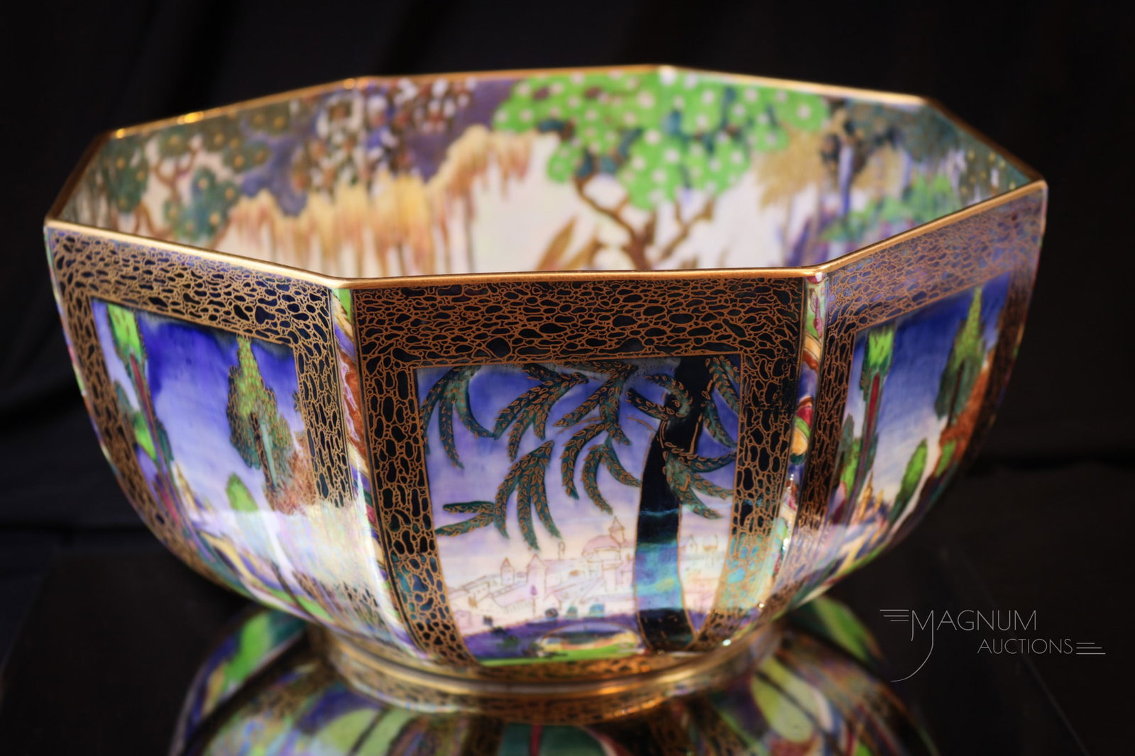 Wedgwood Fairyland Lustre 11" Octagonal Bowl: Fine Wedgwood decorated Fairland Lustre 11" octagonal bowl. Bowl has two motifs unique to the interior and the exterior. "Castle on the Road" is featured on the exterior while "Fairy in cage" is the d