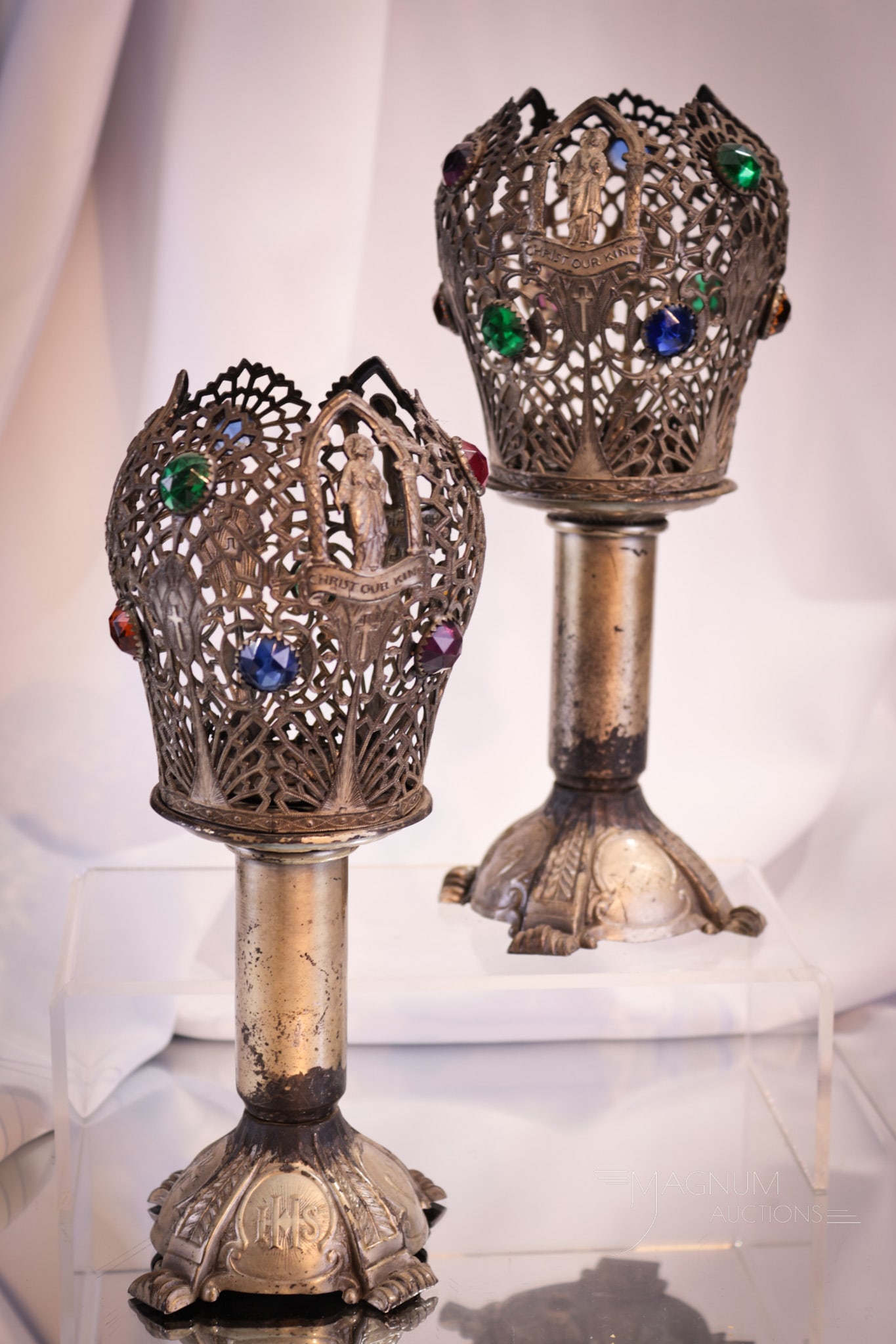 Pair Jeweled Religious "Christ our King" Altar Candles: Select offering of a pair of perforated metal and jeweled altar candles holders. Each with "Christ Our King & Jesus" on the bases. Removabale shades. Each measures 9" tall.