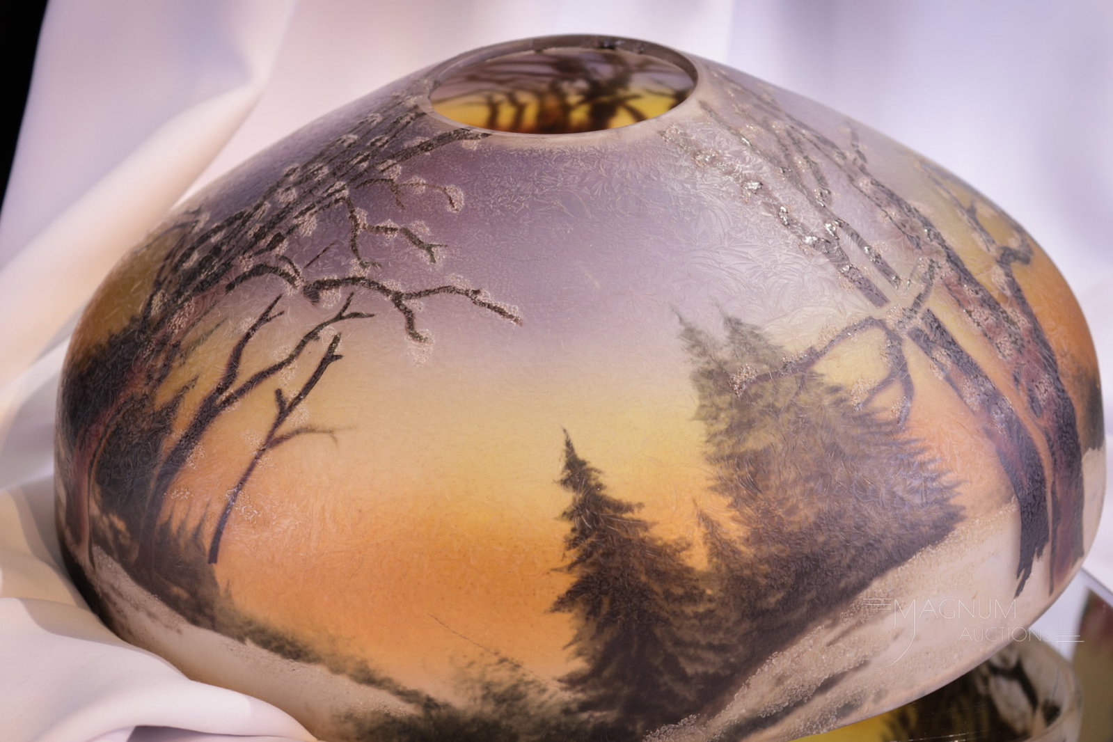 Pittsburgh Reverse Obverse Painted Table lamp Shade: A winter scenic decorated reverse and obverse painted table lamp shade. This shade is unsigned and attributed to Pittsburgh. Shade measures5 1/4" tall, 14" in diameter.