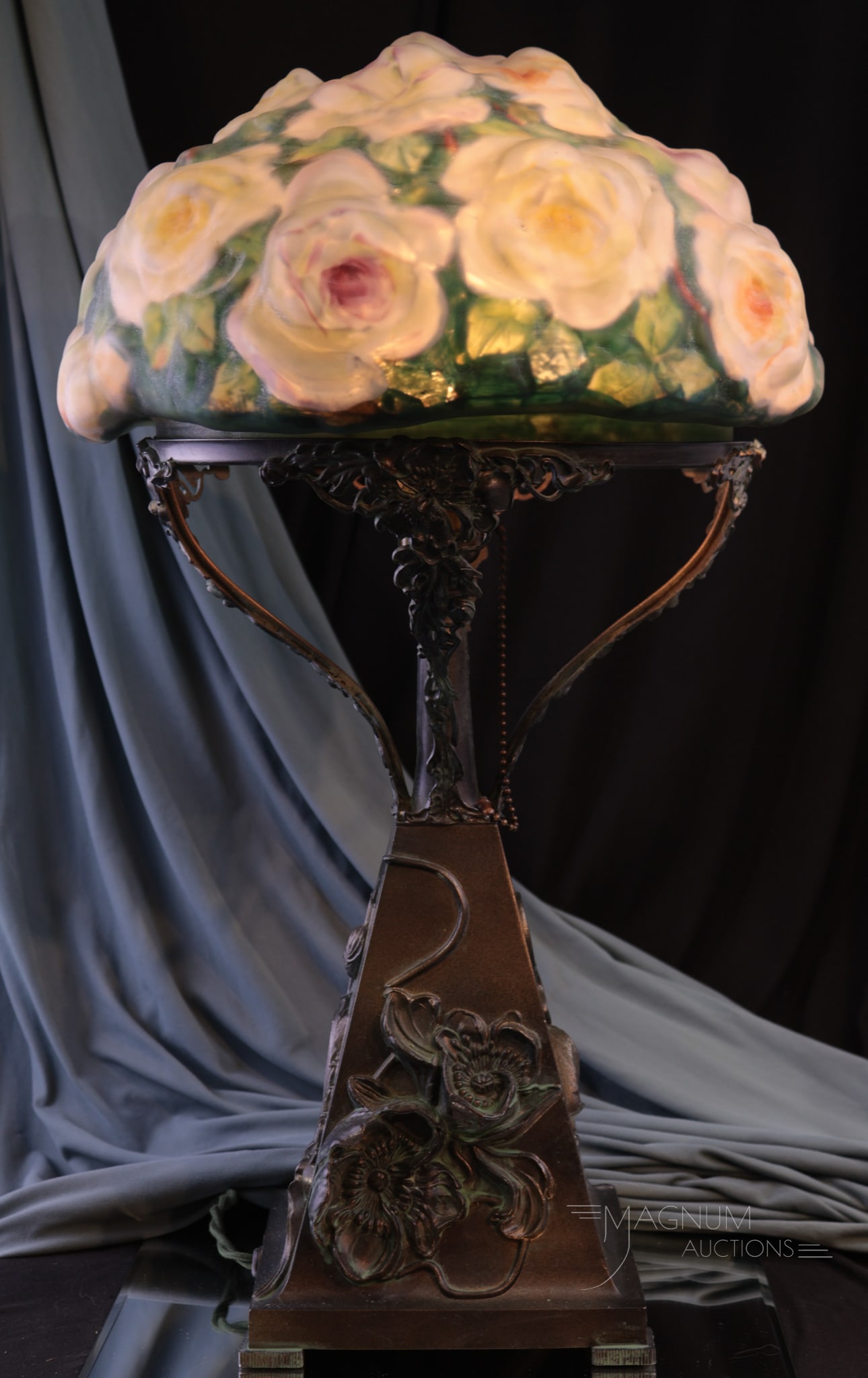 Pairpoint Puffy Reverse Painted Rose Bouquet Table Lamp: Beautiful Pairpoint reverse painted rose bouquet table lamp. The signed shade features white roses with touches of yellow, pink, and orange on the edges of the petals. Shade sits on an original Pairpo