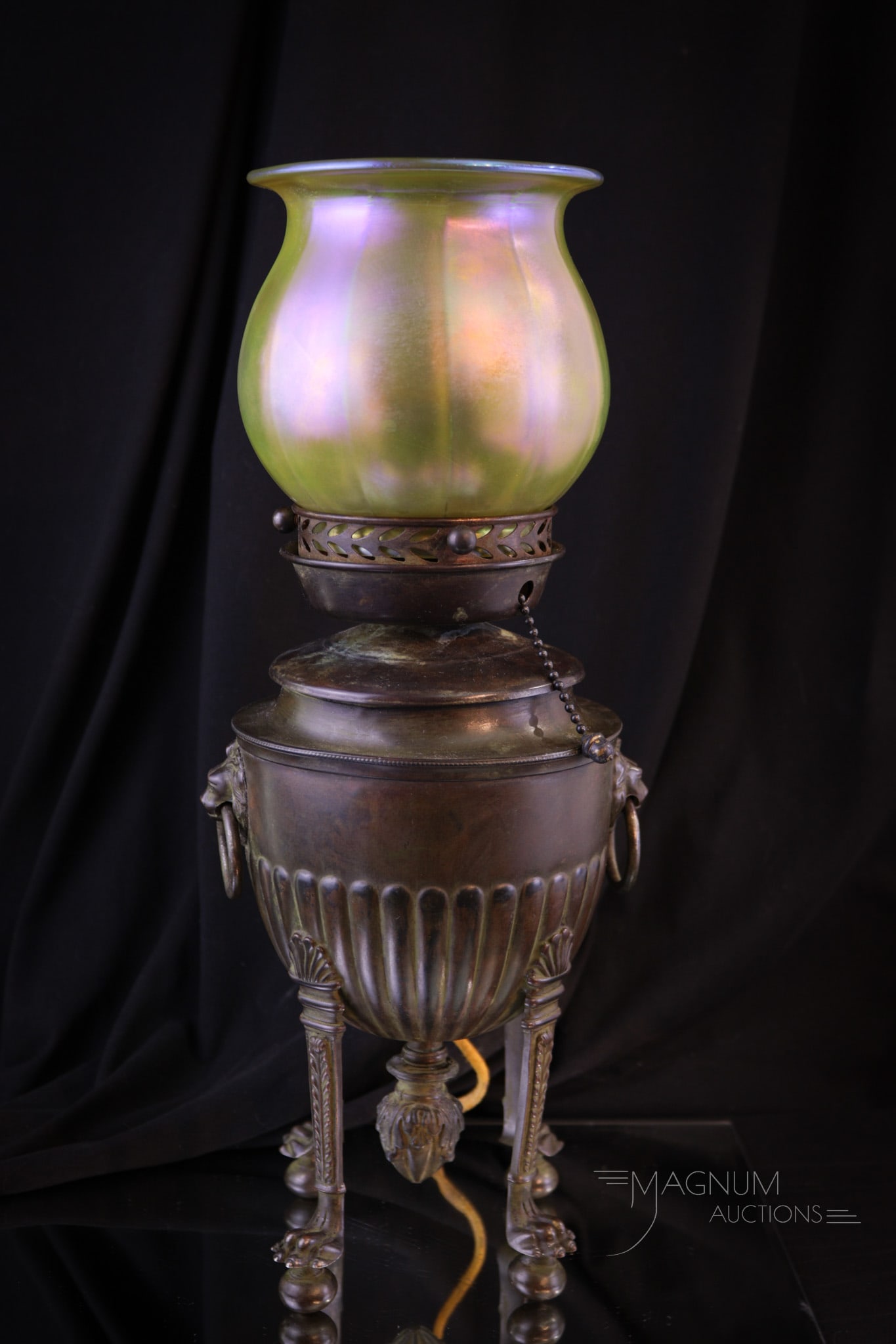 Irridescent Art Glass Shade & Modified Oil Lamp: Mother Magnum gave a side glance when she saw this consignment come in the door. We all could see what she was thinking. She wiped her mouth after finishing her caviar and morning mimosa. She shook he