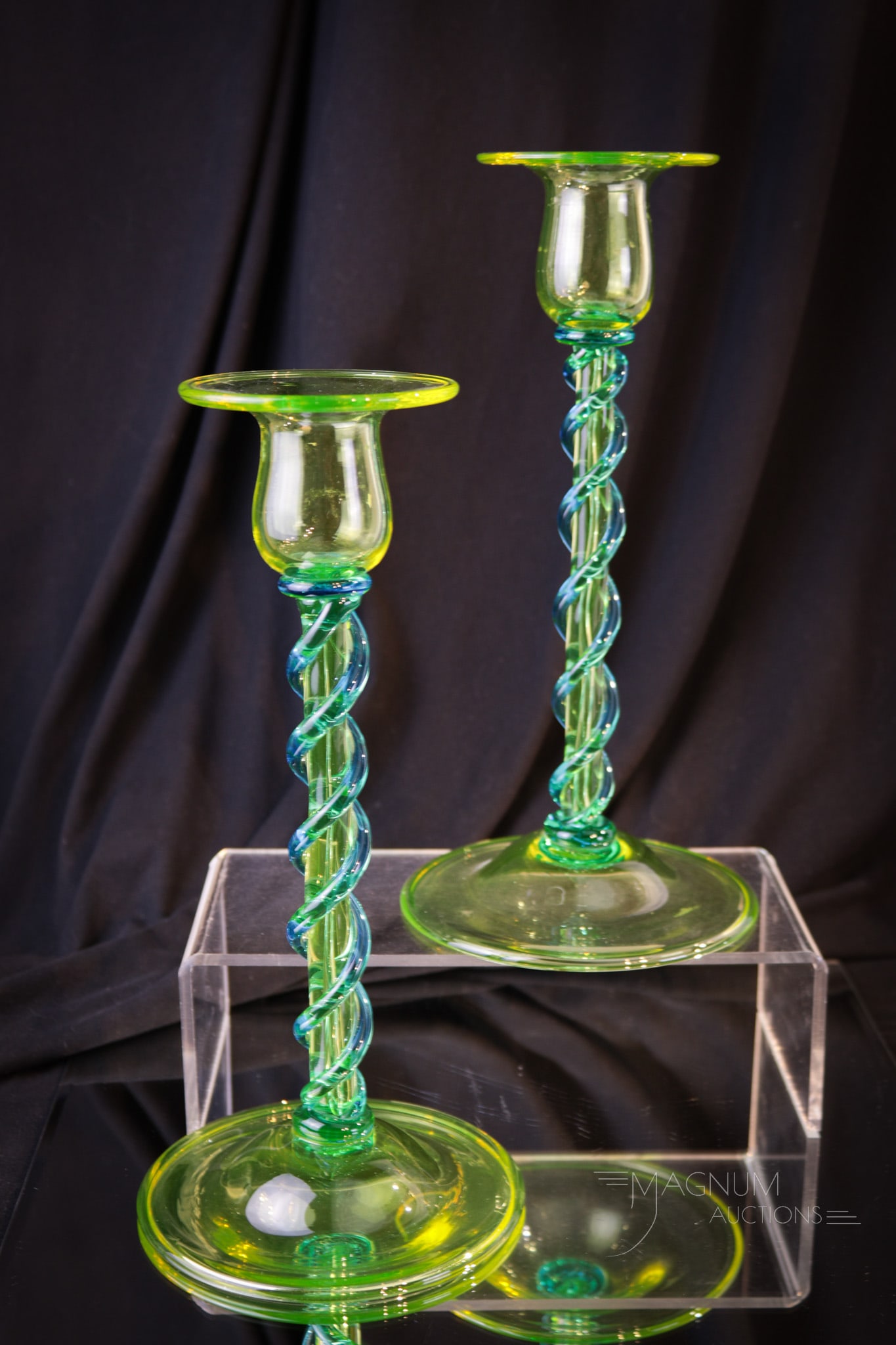 Pair Steuben Topaz Vaseline Celeste Blue Twist Candlsticks: Select pair of Steuben Topaz (vaseline) and Celeste blue twist form candlsticks. Each measures 10" tall. Steuben shape #5114.