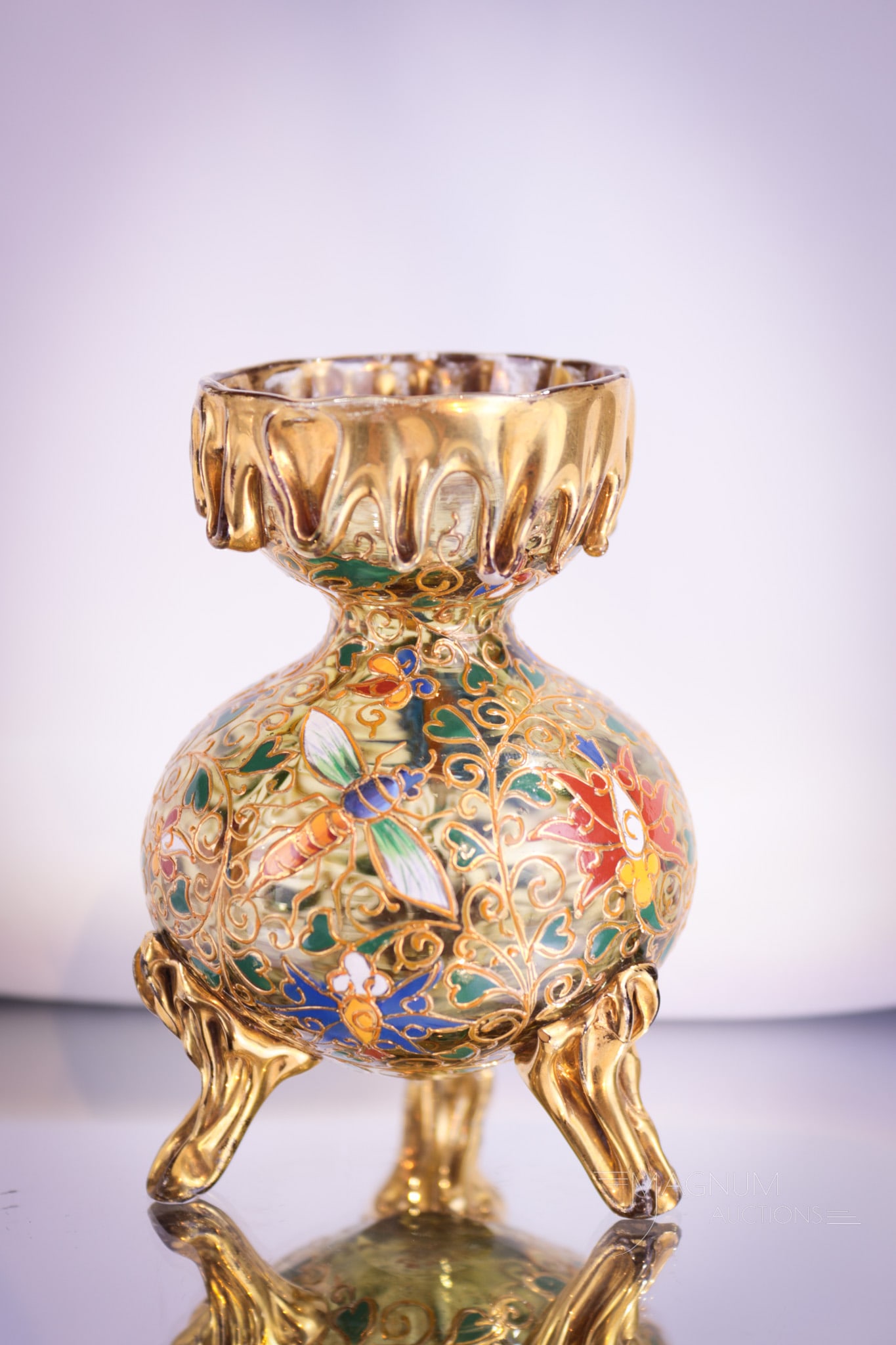Moser Amber Enameled Gilt Cabinet Vase: Beautiful honey amber glass with applied drip decoration and gilt enameling makes up this fine cabinet vase. This piece with wasp decoration in heavy gold along with florals. Vase measures 3 3/4" tall