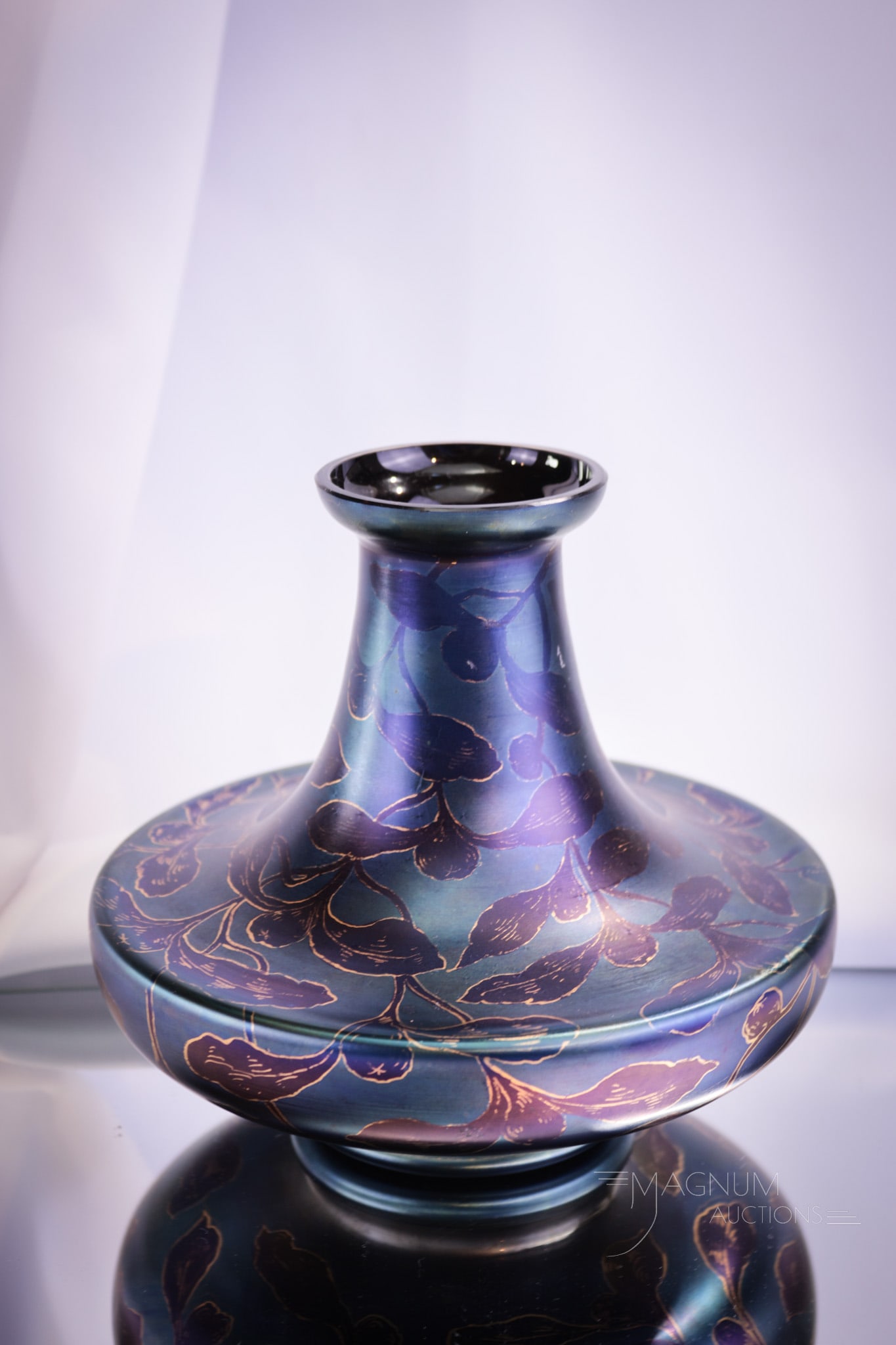 Loetz DEK Etching Ink ca. 1900 Mistletoe Glass Vase: A superb example of Loetz DEK etching Ink ca. 1900. in the Mistletoe pattern glass vase. Vase measures 6 1/4" tall. Nice coloring around the piece.