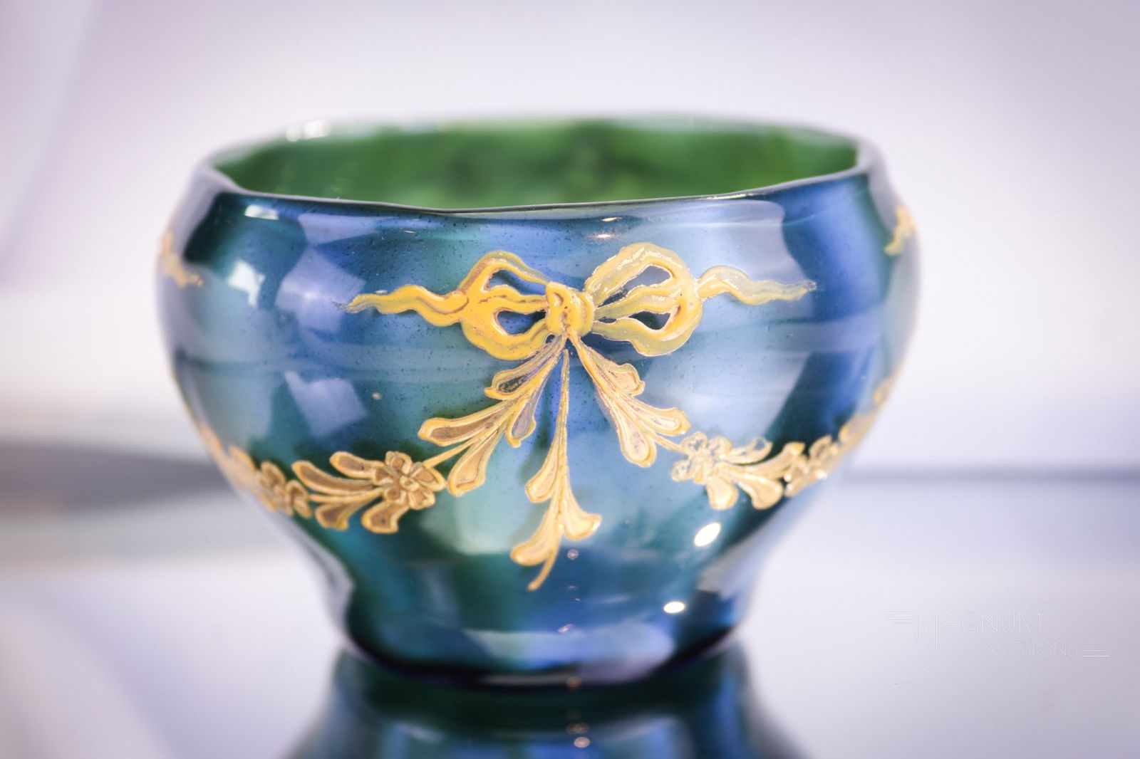 Loetz Blue Melusin ca. 1905 Decorated Art Glass Vase: Charming Loetz blue Melusin decorated vase. Vase is circa 1905. Nice form and irridescence. Piece measures 2 3/4" tall.