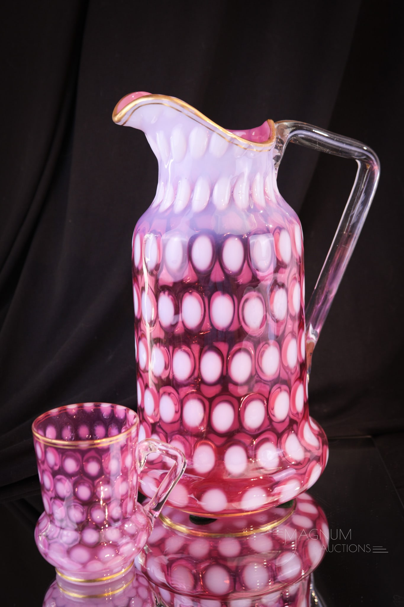 Rare Cranberry Opalescent Victorian Tankard Pitcher & Mug: A rarely found form for a Victorian cranberry opalescent tankard pitcher and mug. Each piece with gold trim. Tallest measures 10 1/2" tall.
