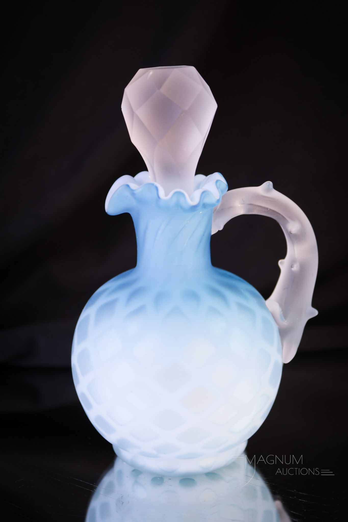 Miniature Blue Mother of Pearl Victorian Glass Cruet: A tiny gem here folks! This little cutie of a cruet measures in at only 4 3/4" tall. It's blue diamond quilt Victorian Mother of Pearl satin glass and has an applied thorn handle. Complete with froste