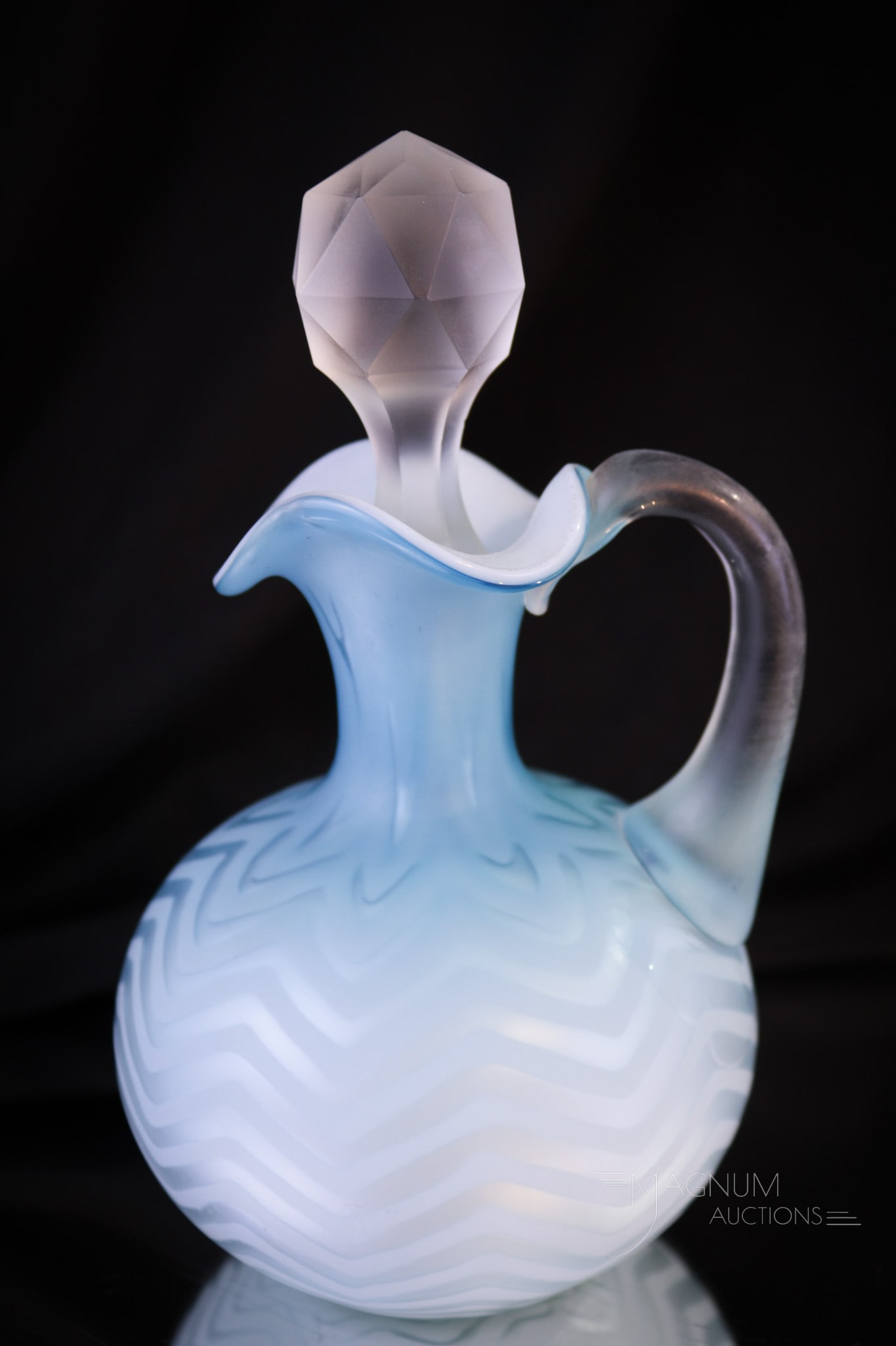 Phoenix Victorian Mother of Peal Herringbone Satin Glass Cruet: A fine find in Victorian Mother of Pearl glass. This attributed to Phoenix glass cruet is in the Herringbone pattern and is in a lovely shaded blue coloring. Complete with applied handle. Cruet measur