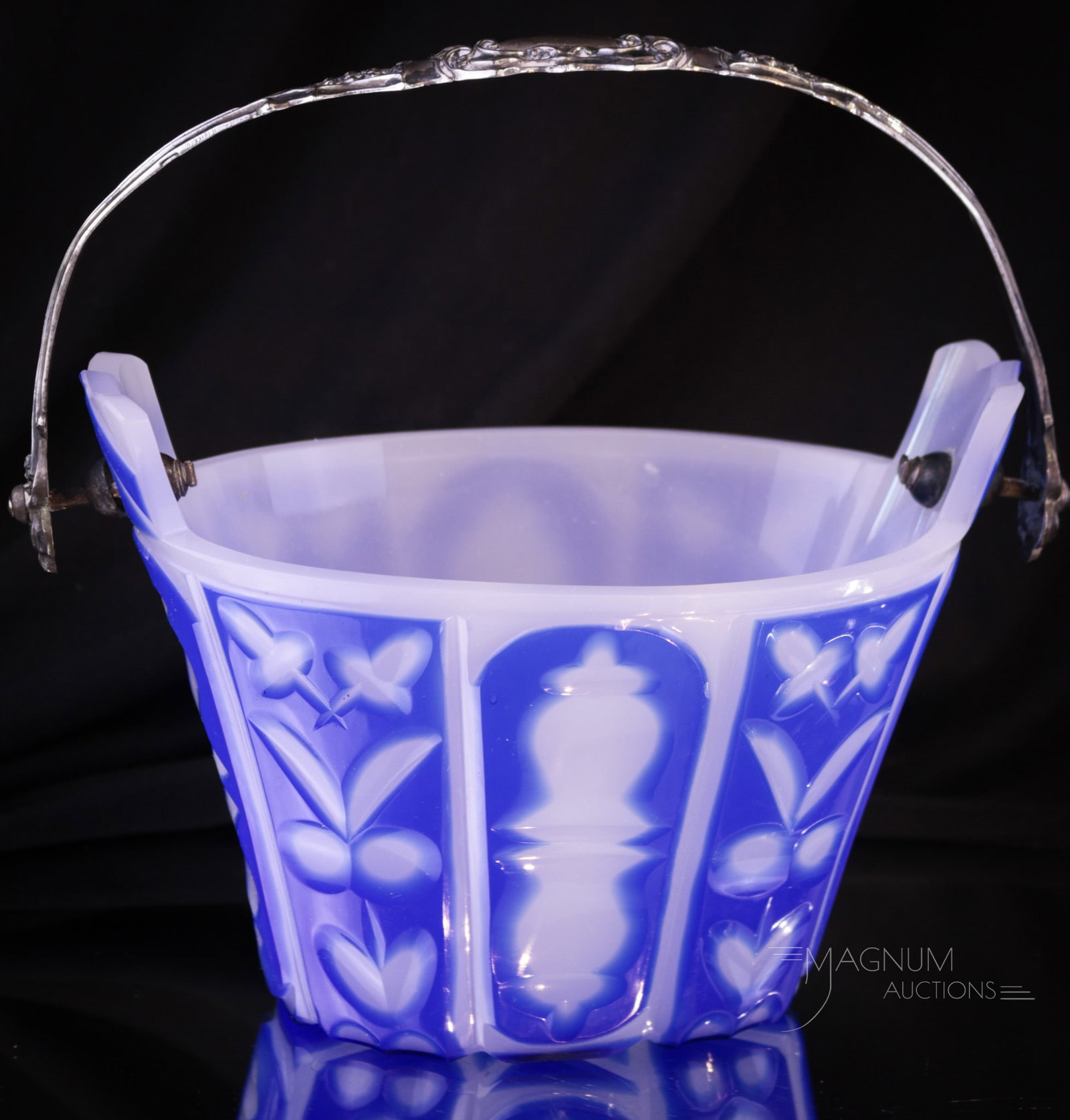 Cut Overlay Blue Opaline Glass Basket: Lovely cut overlay opaline glass basket with possible sterling handle. This oval form glass basket is very unique. It measures 7" tall.